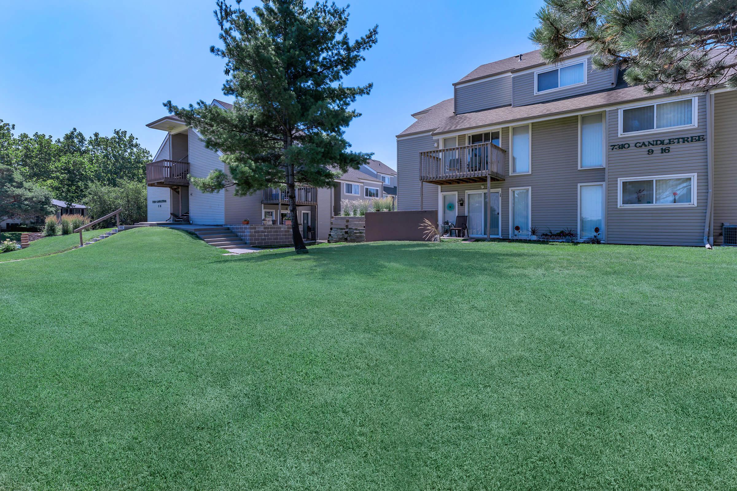 a large lawn in front of a house