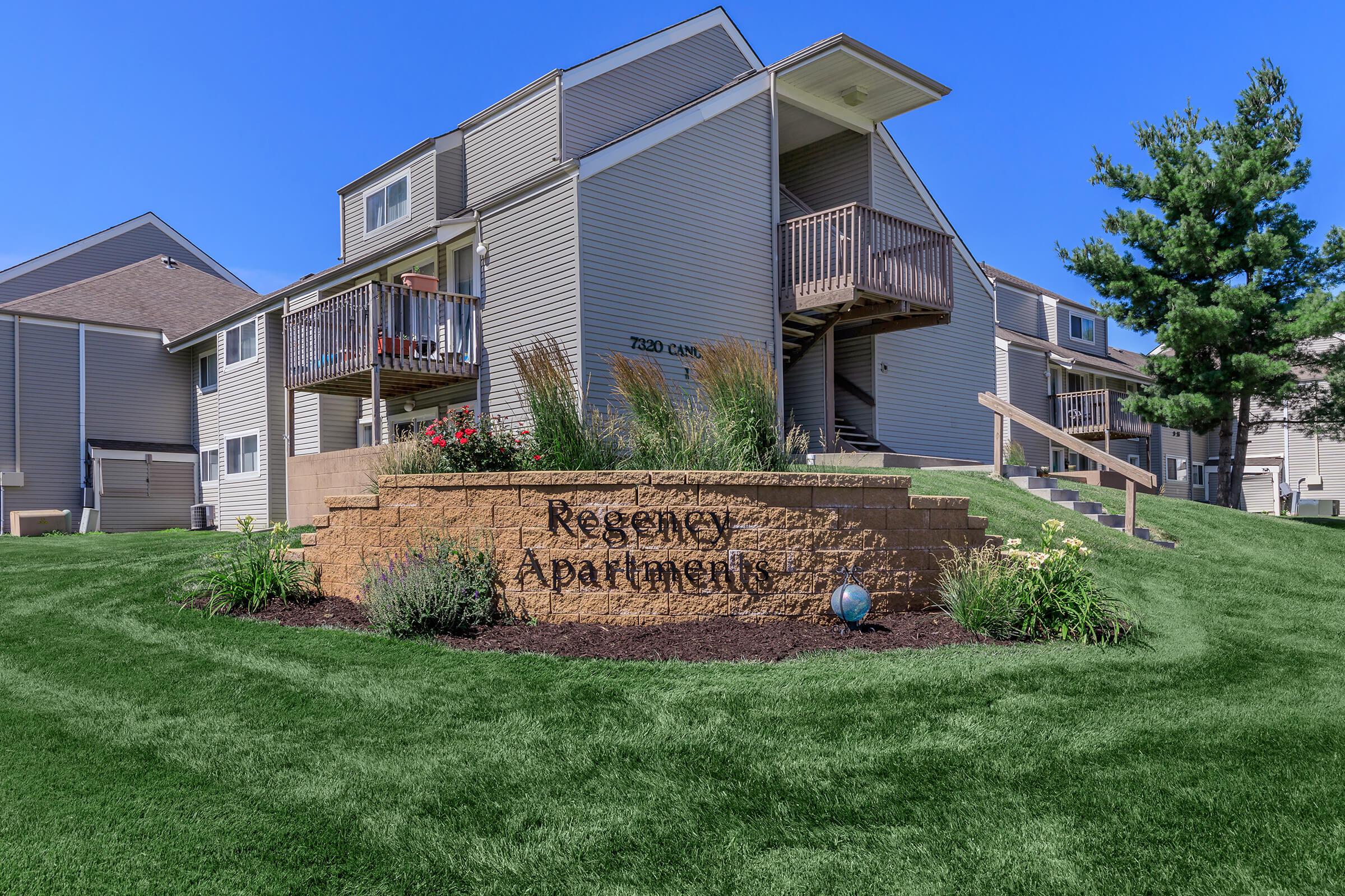 a large lawn in front of a house