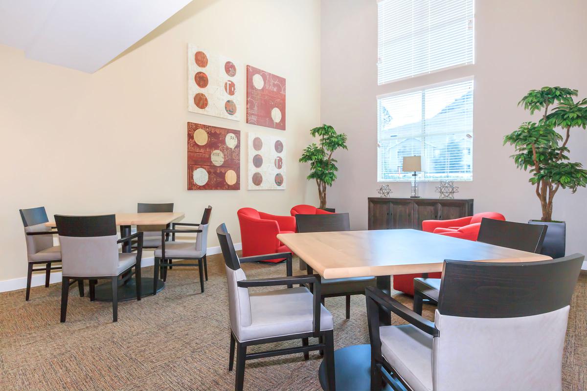 The community room with tables and chairs