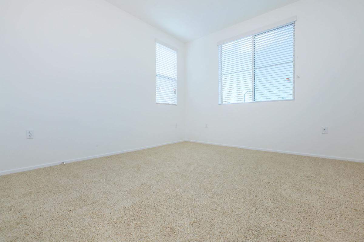 Unfurnished bedroom with carpet