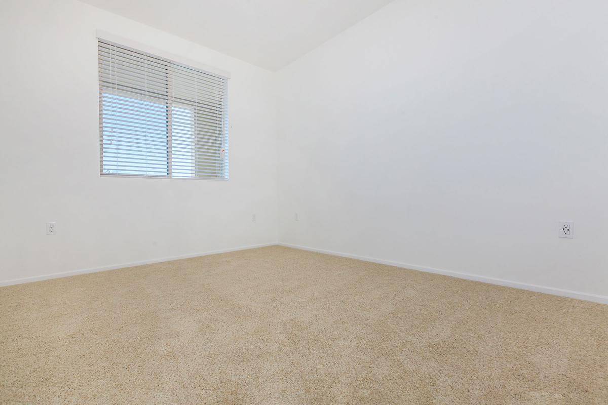 Unfurnished carpeted bedroom