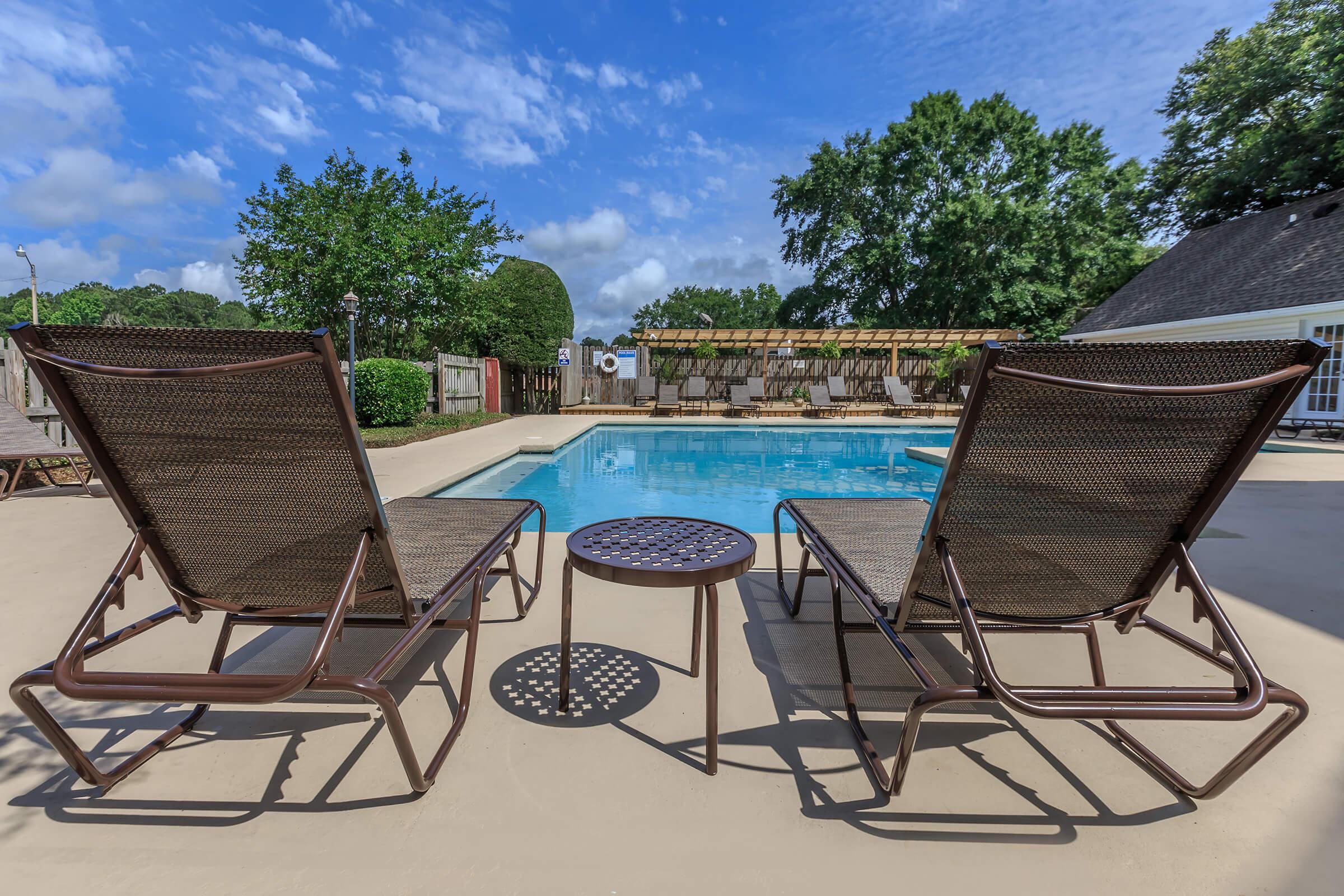 Lounge by the sparkling swimming pool