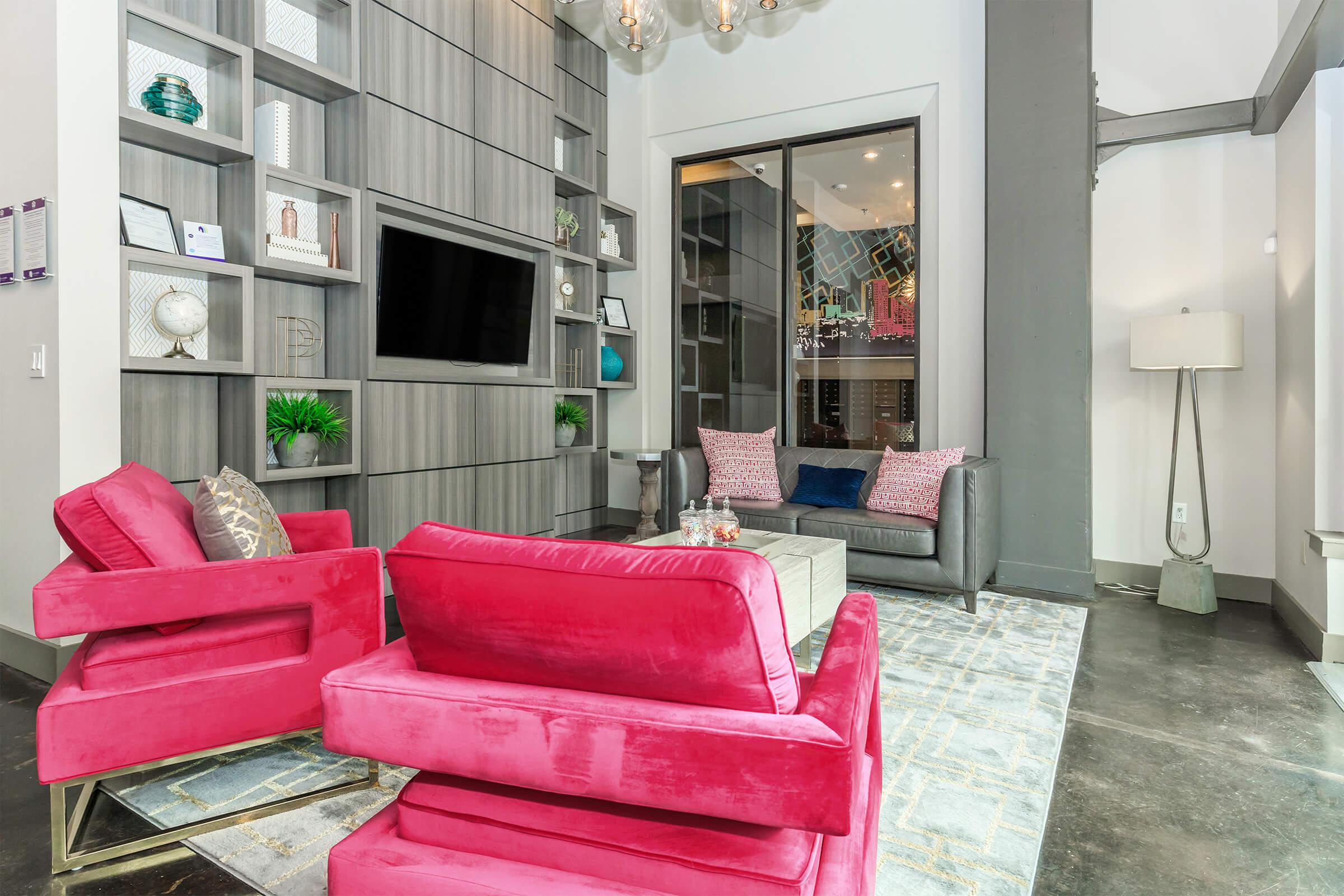 a red leather couch in front of a building