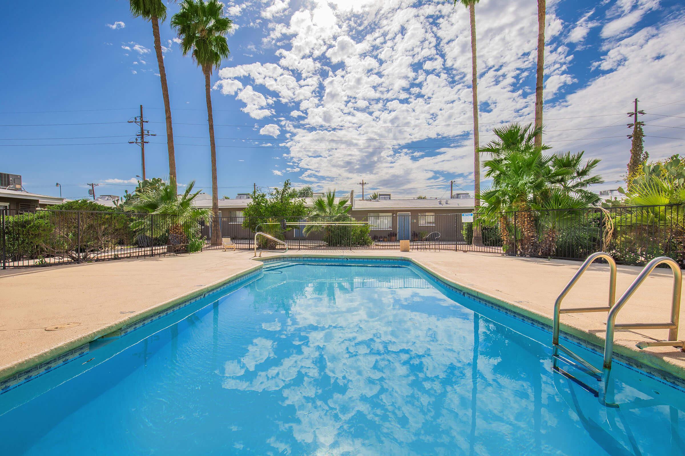 a pool next to a body of water