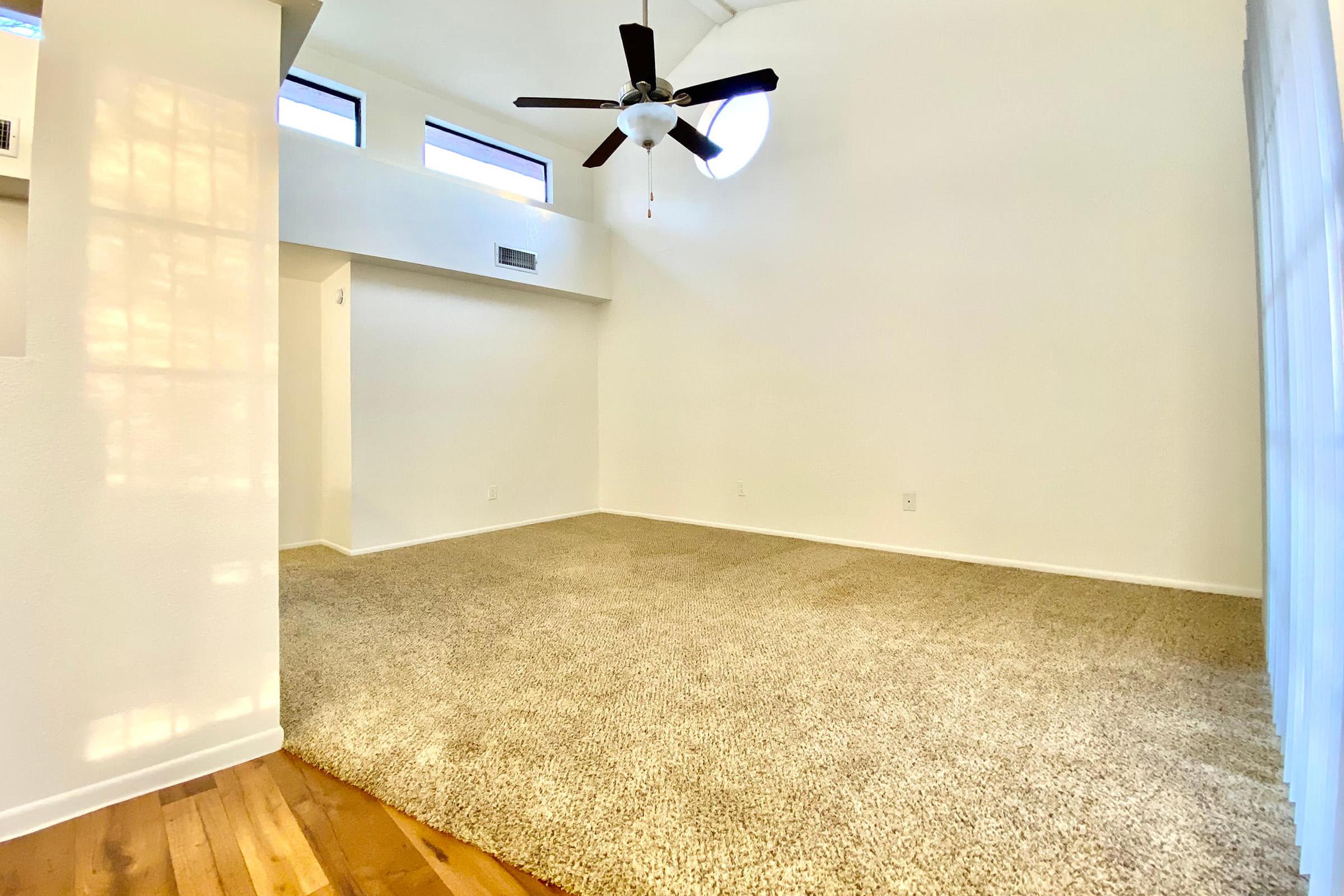 a bedroom with a large mirror