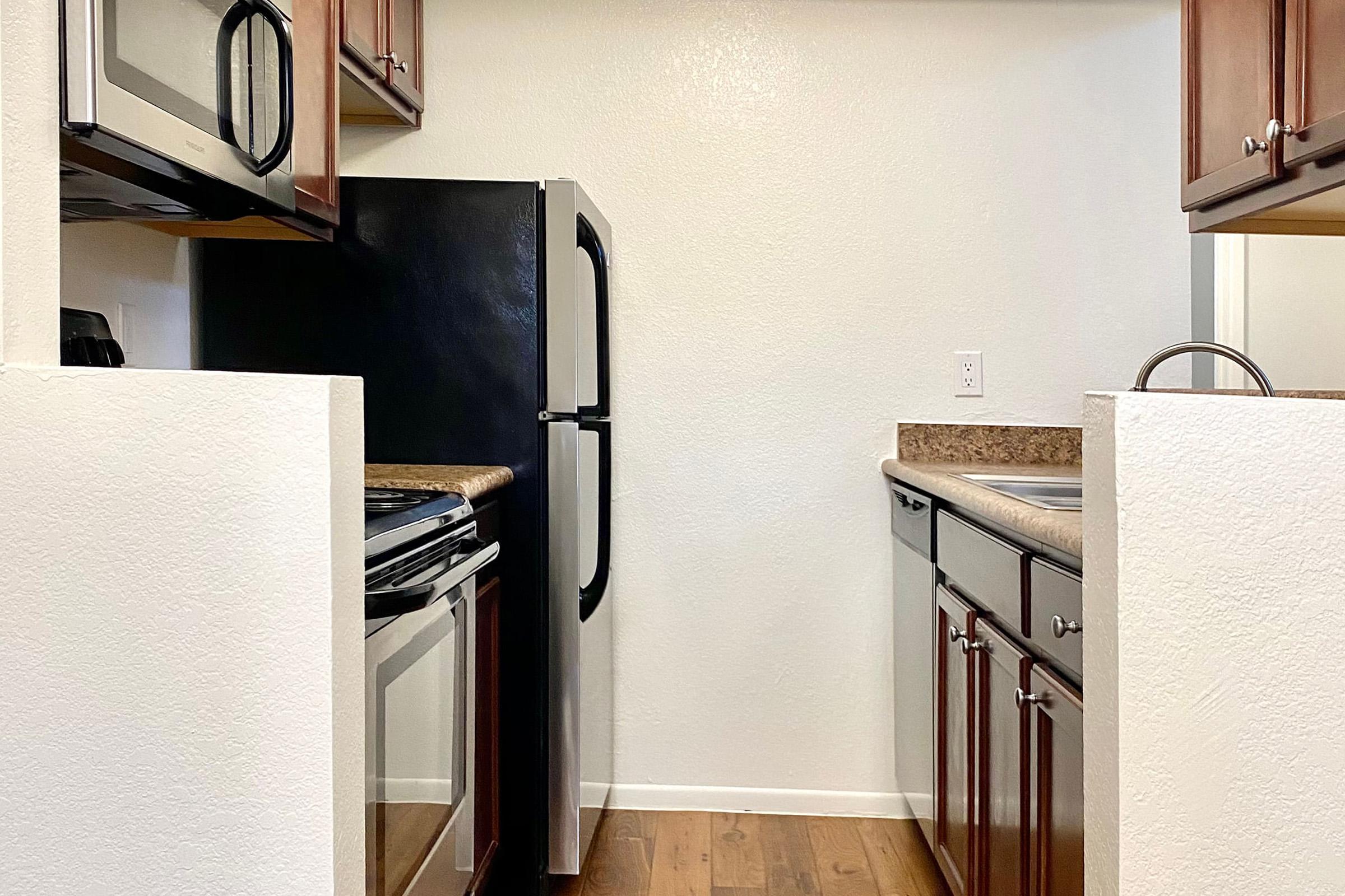 a stainless steel refrigerator in a kitchen