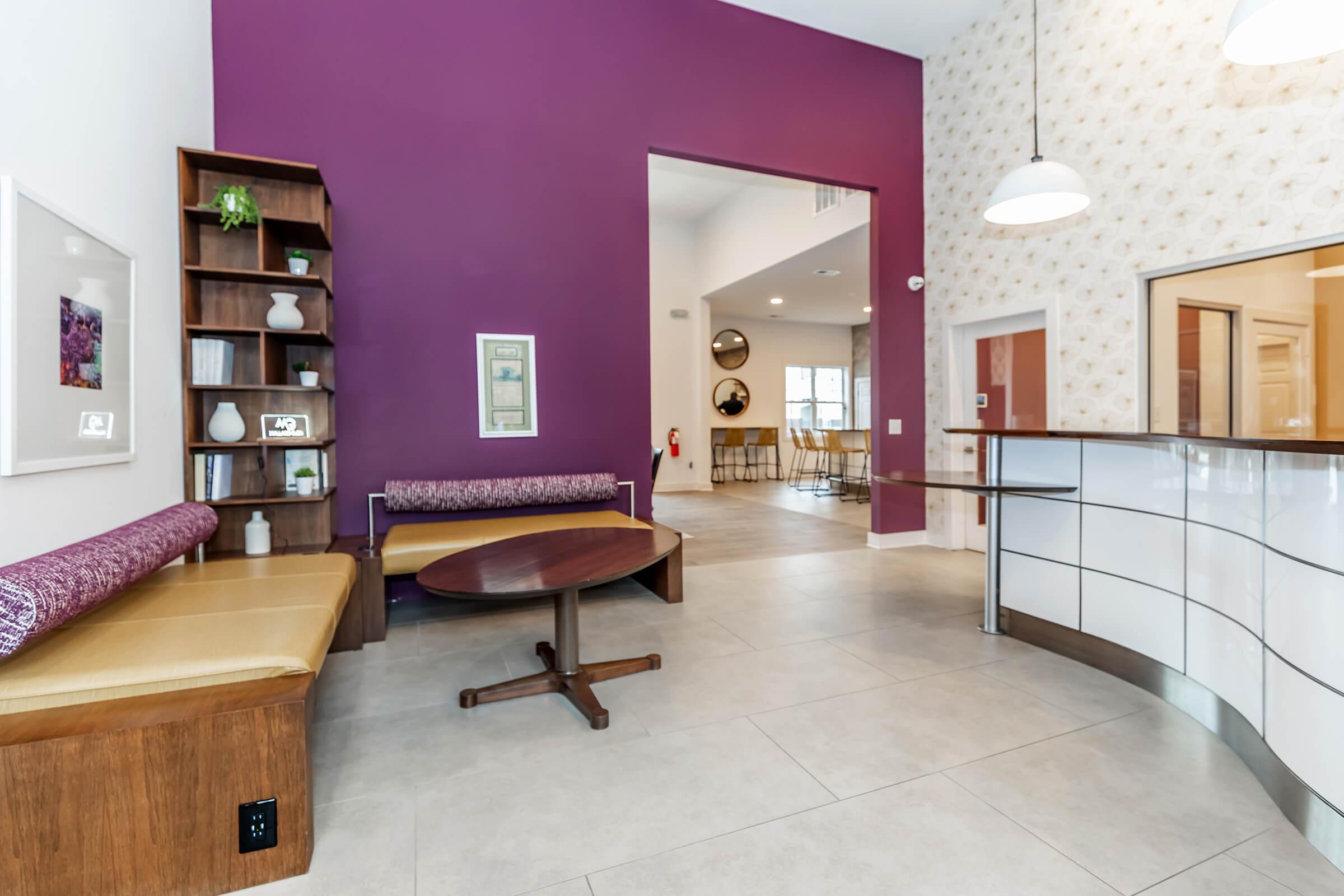 a room filled with furniture and a wood floor