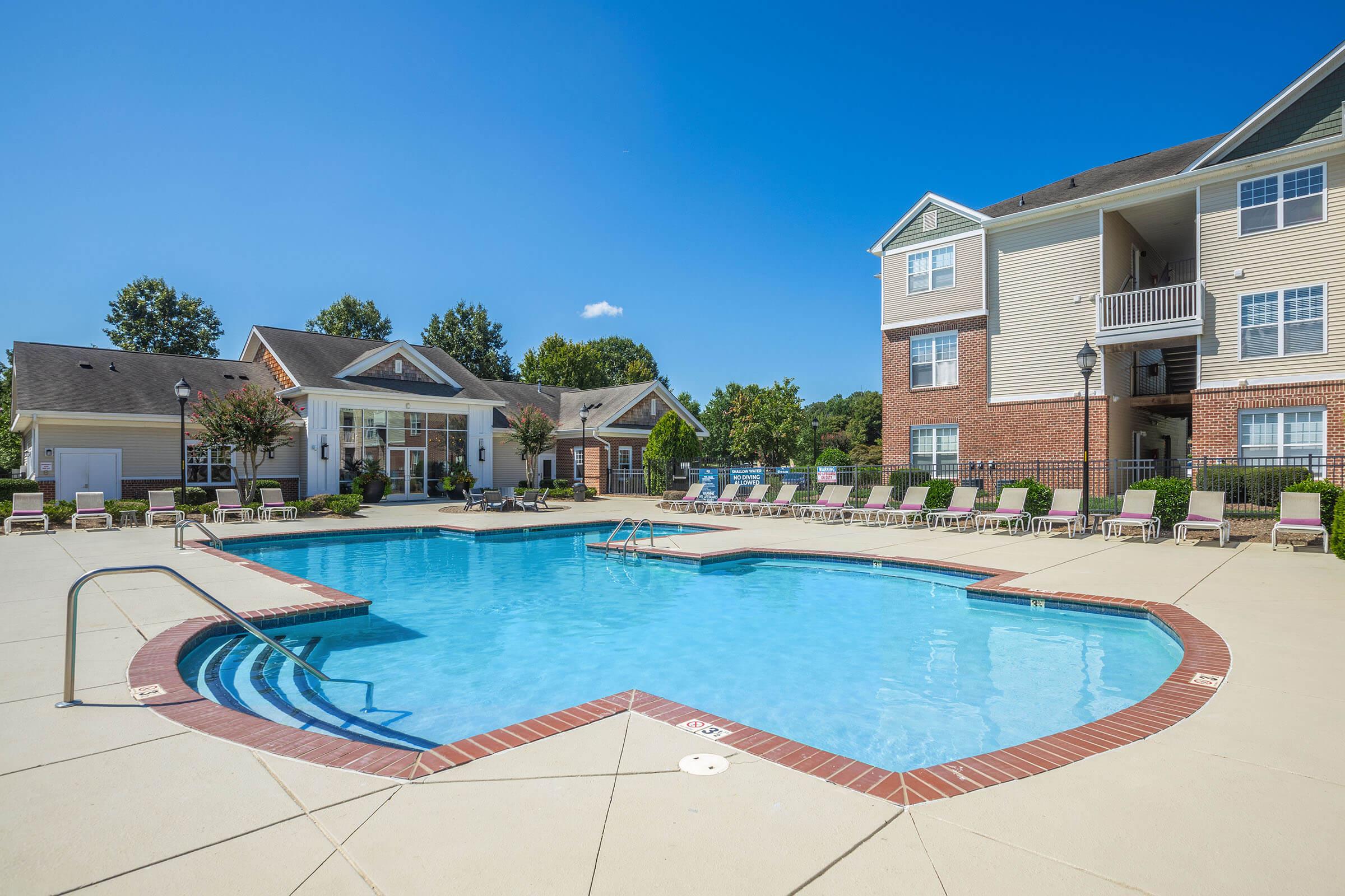 a house with a large pool of water