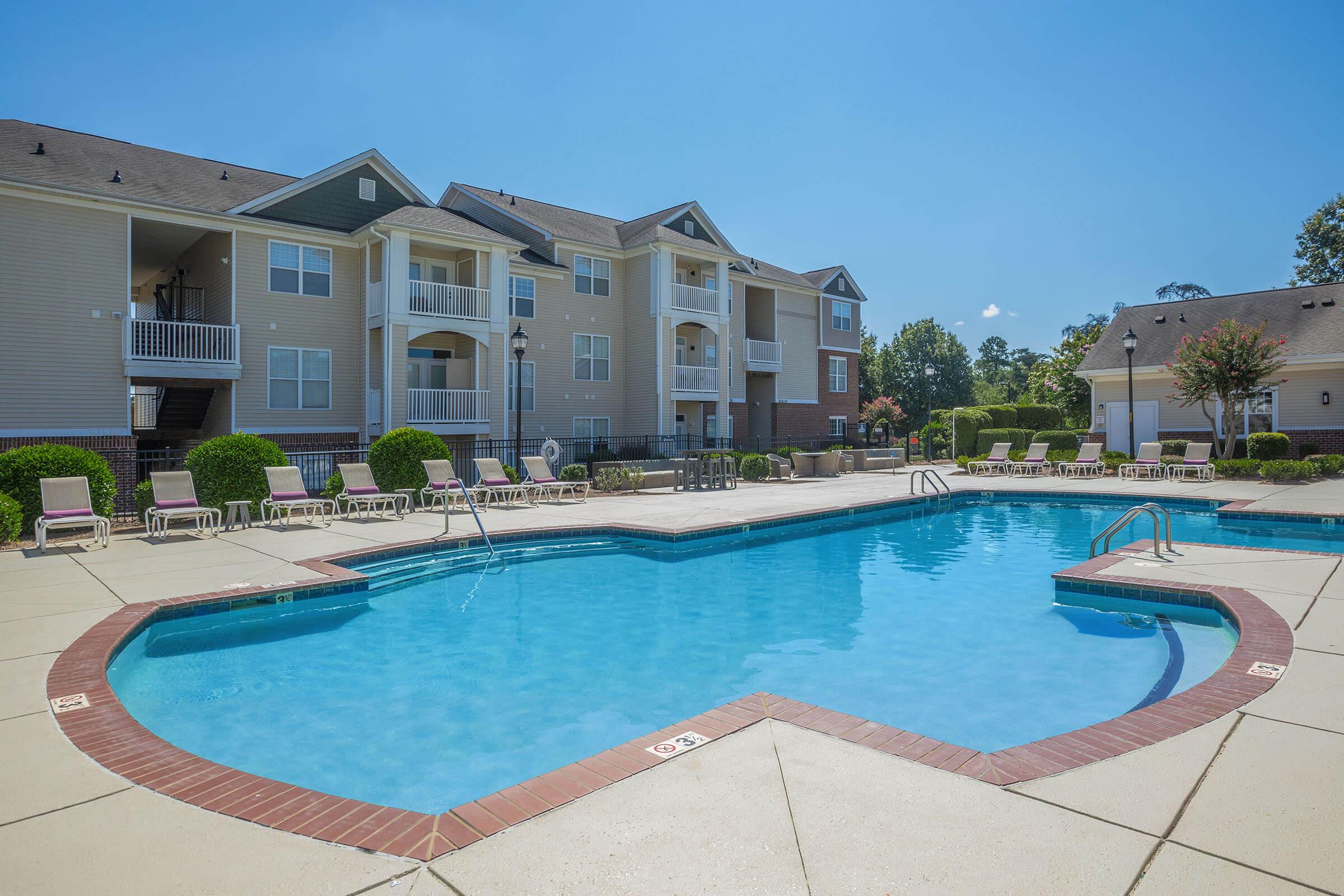 a house with a large pool of water