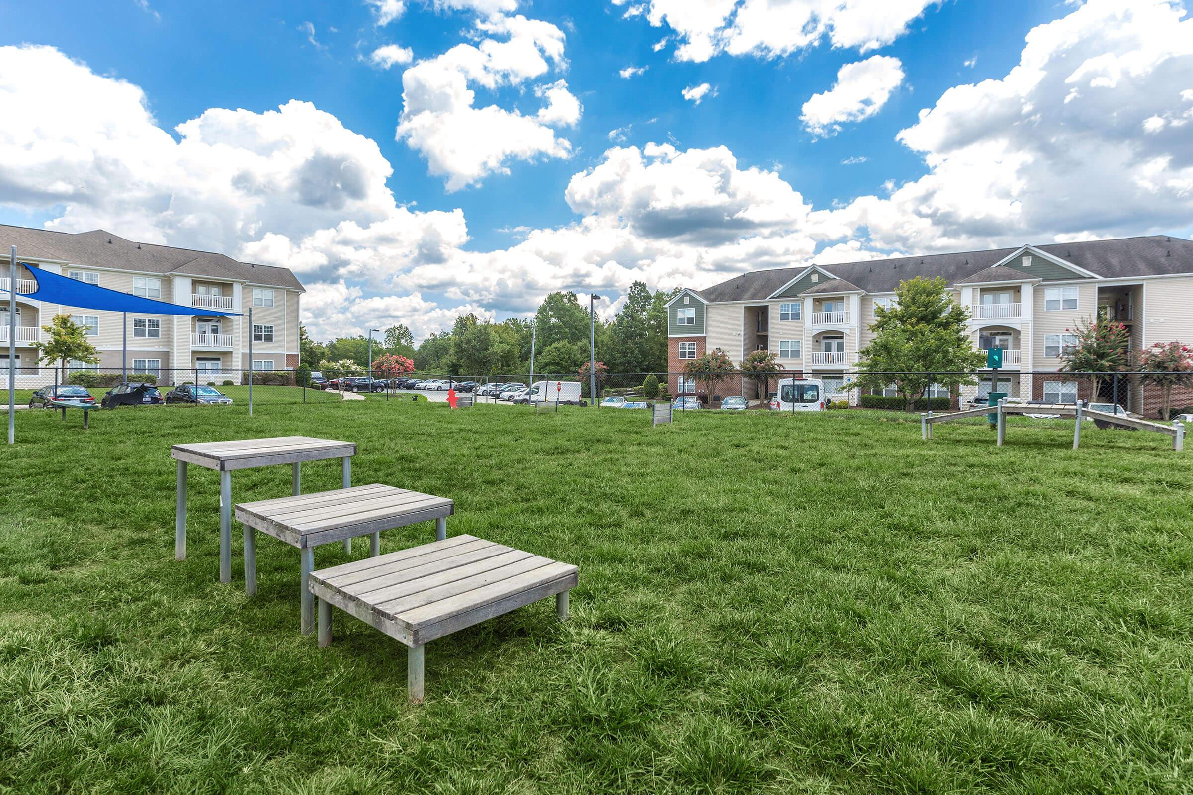 a building with a grassy field