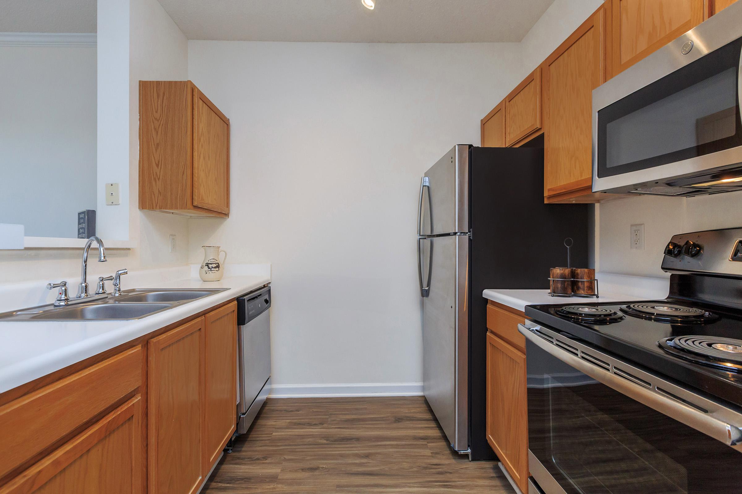 a kitchen with a stove top oven