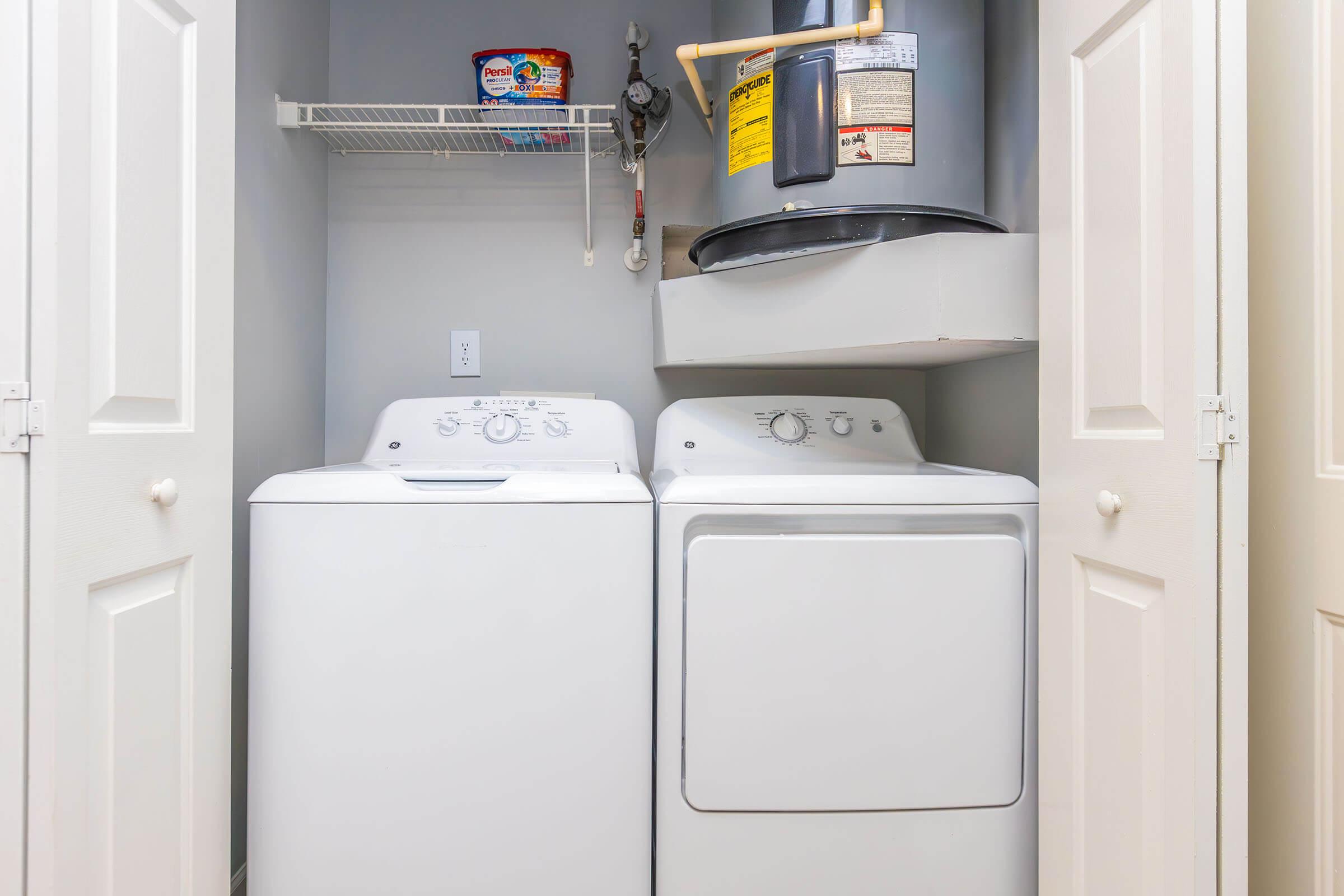 a stove top oven sitting inside of a refrigerator