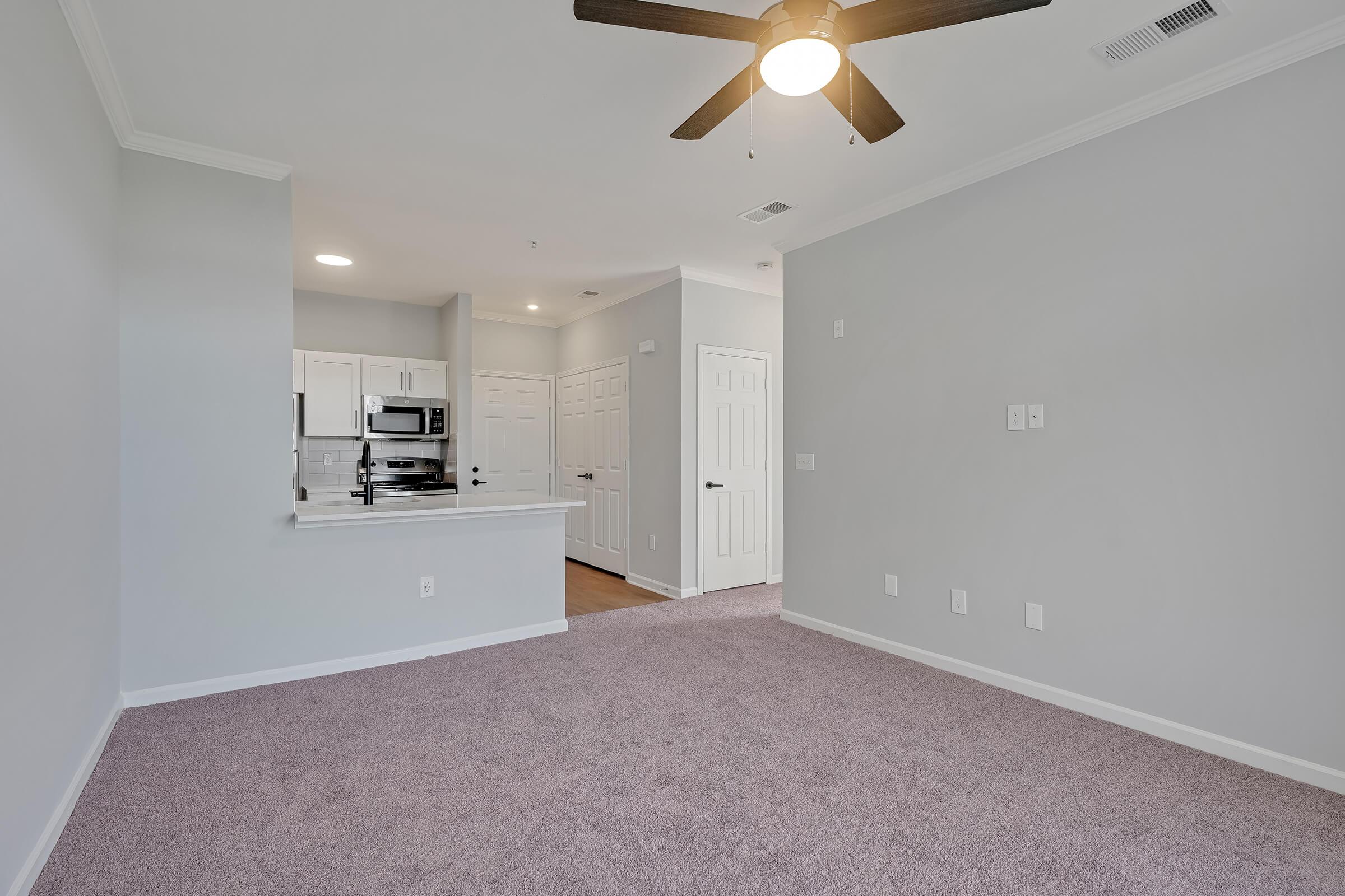 a bedroom with a large mirror