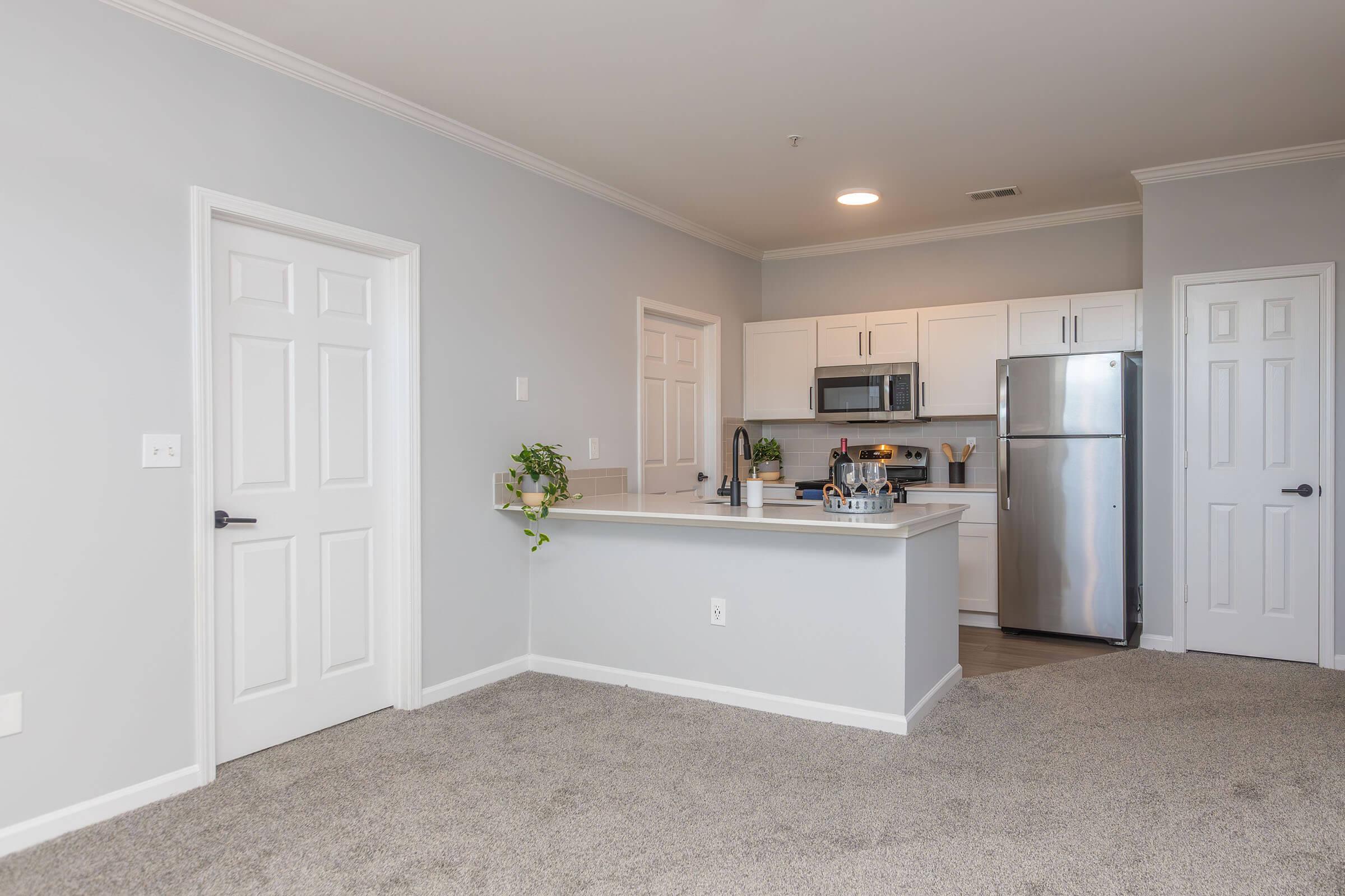 a kitchen with a sink and a window