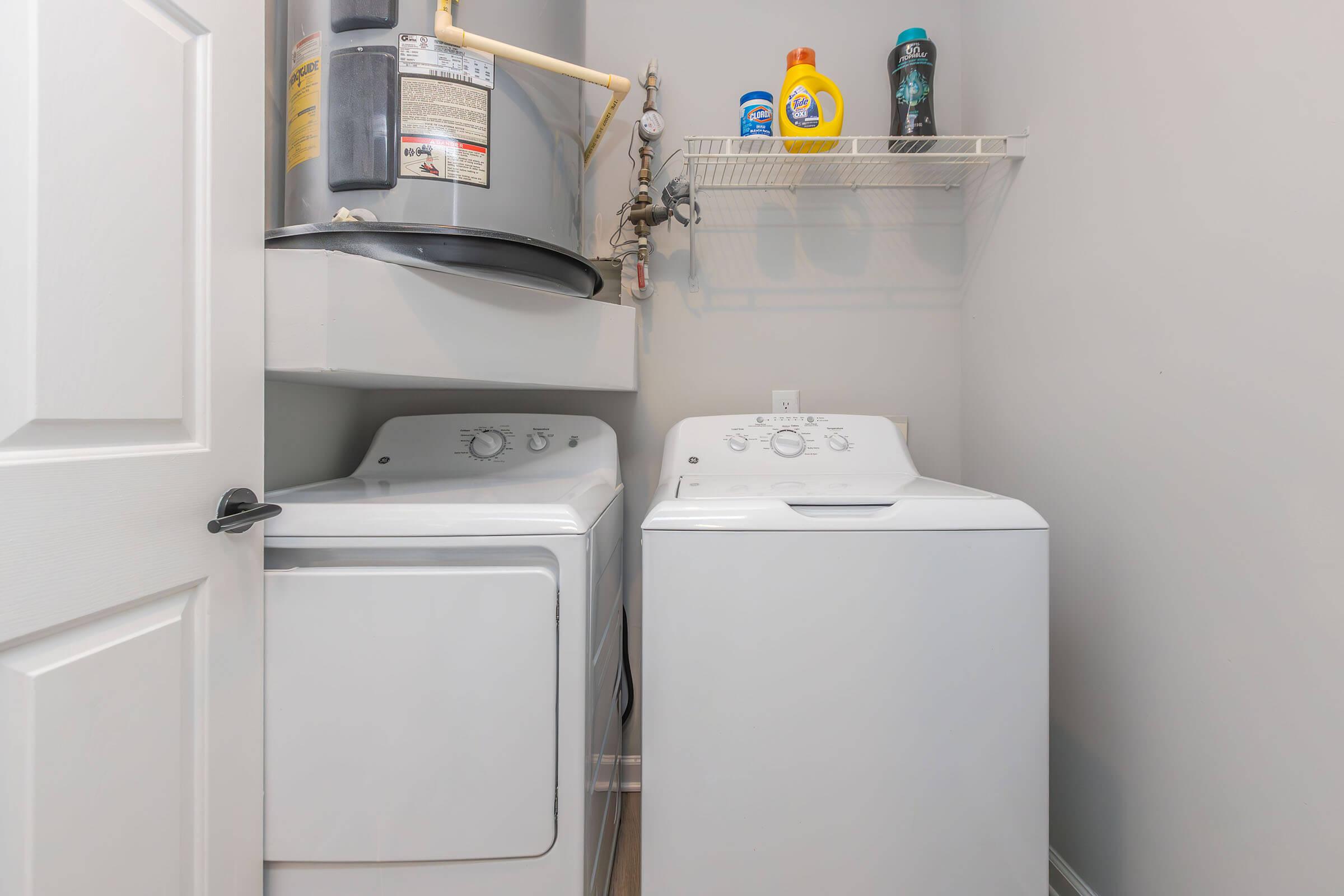 a stove top oven sitting inside of a refrigerator