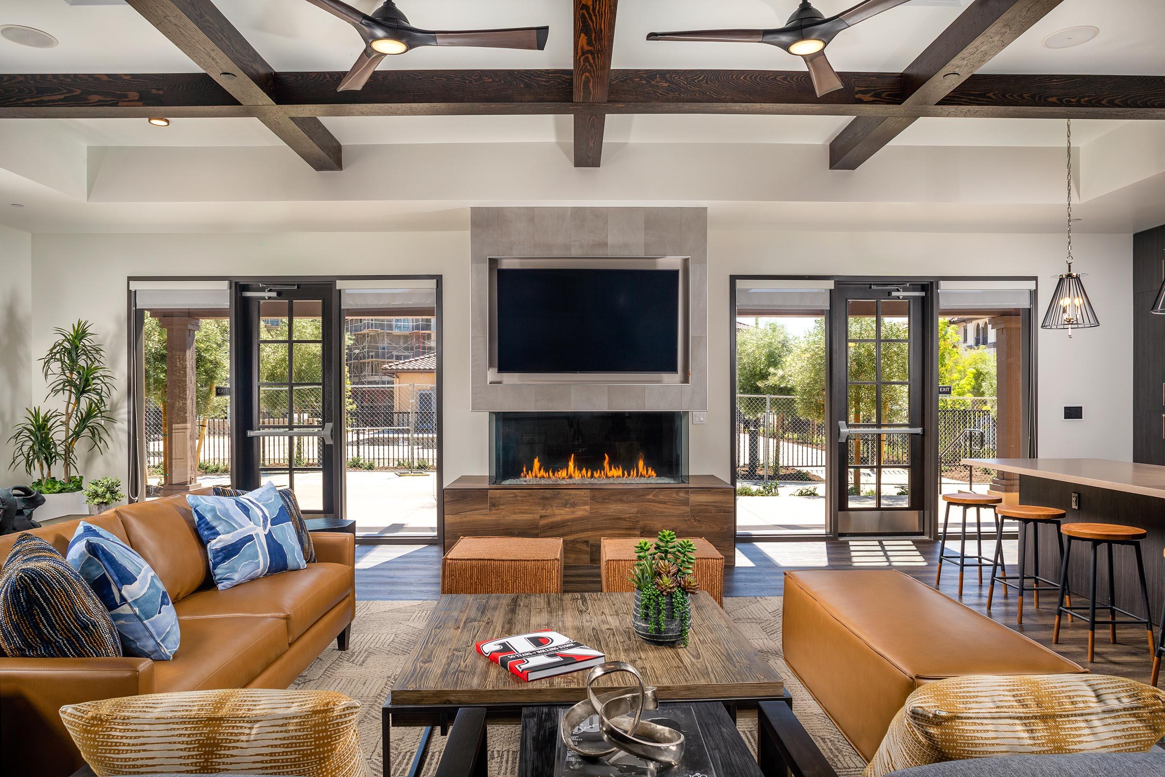 a living room filled with furniture and a fire place