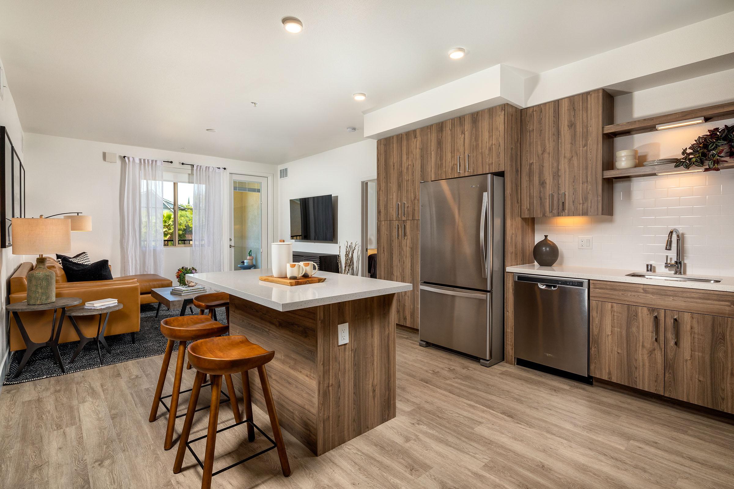 a room filled with furniture and a wood floor