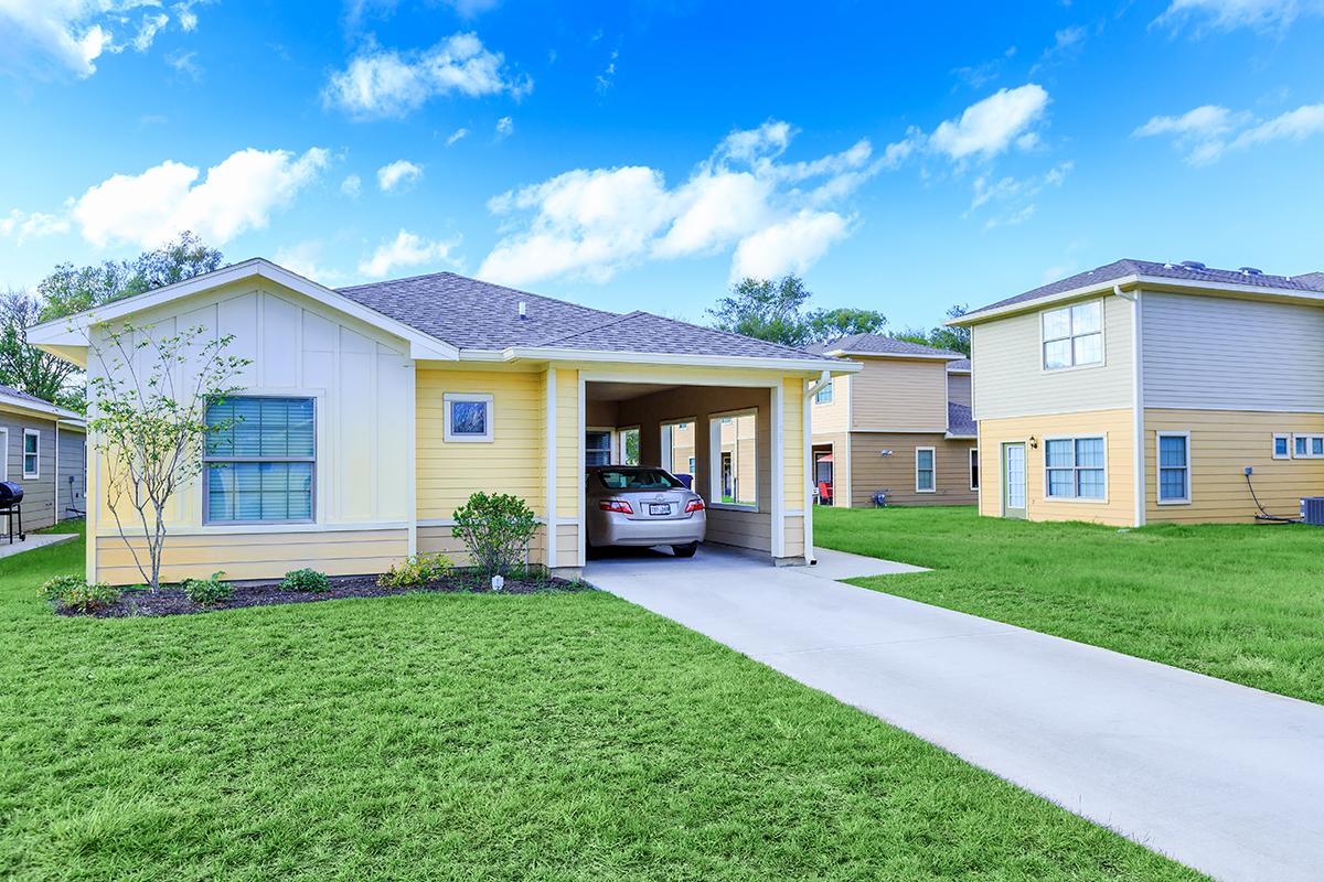 a large lawn in front of a house