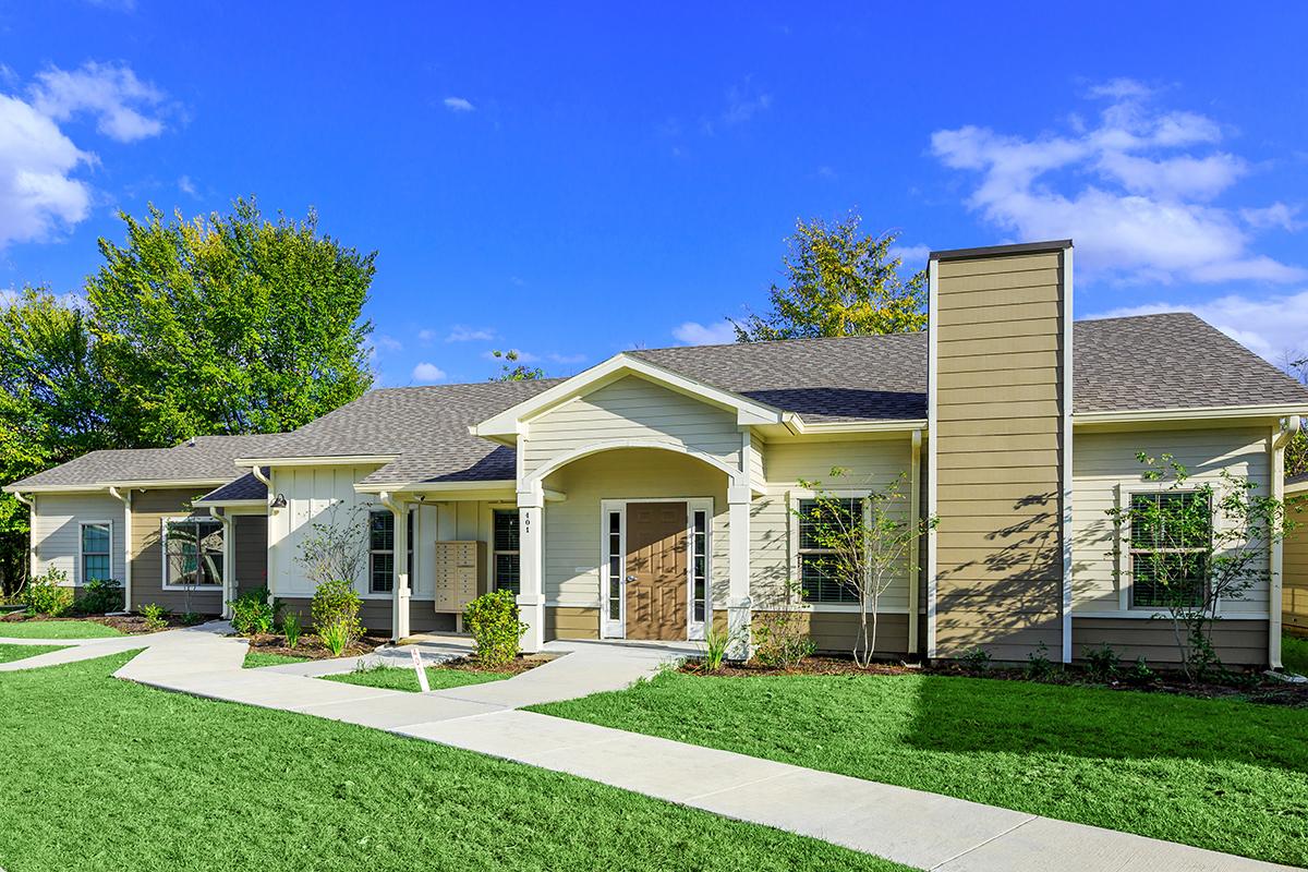 a large lawn in front of a house