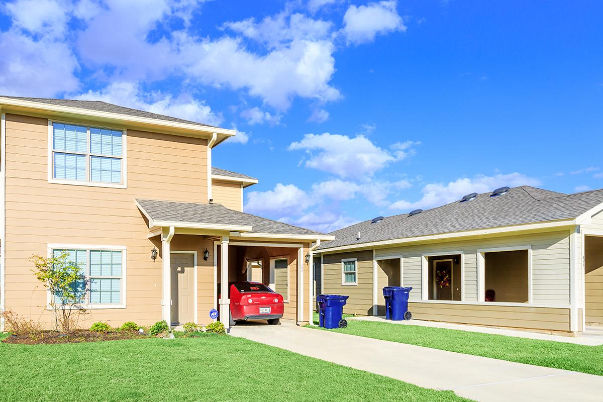 a large lawn in front of a house