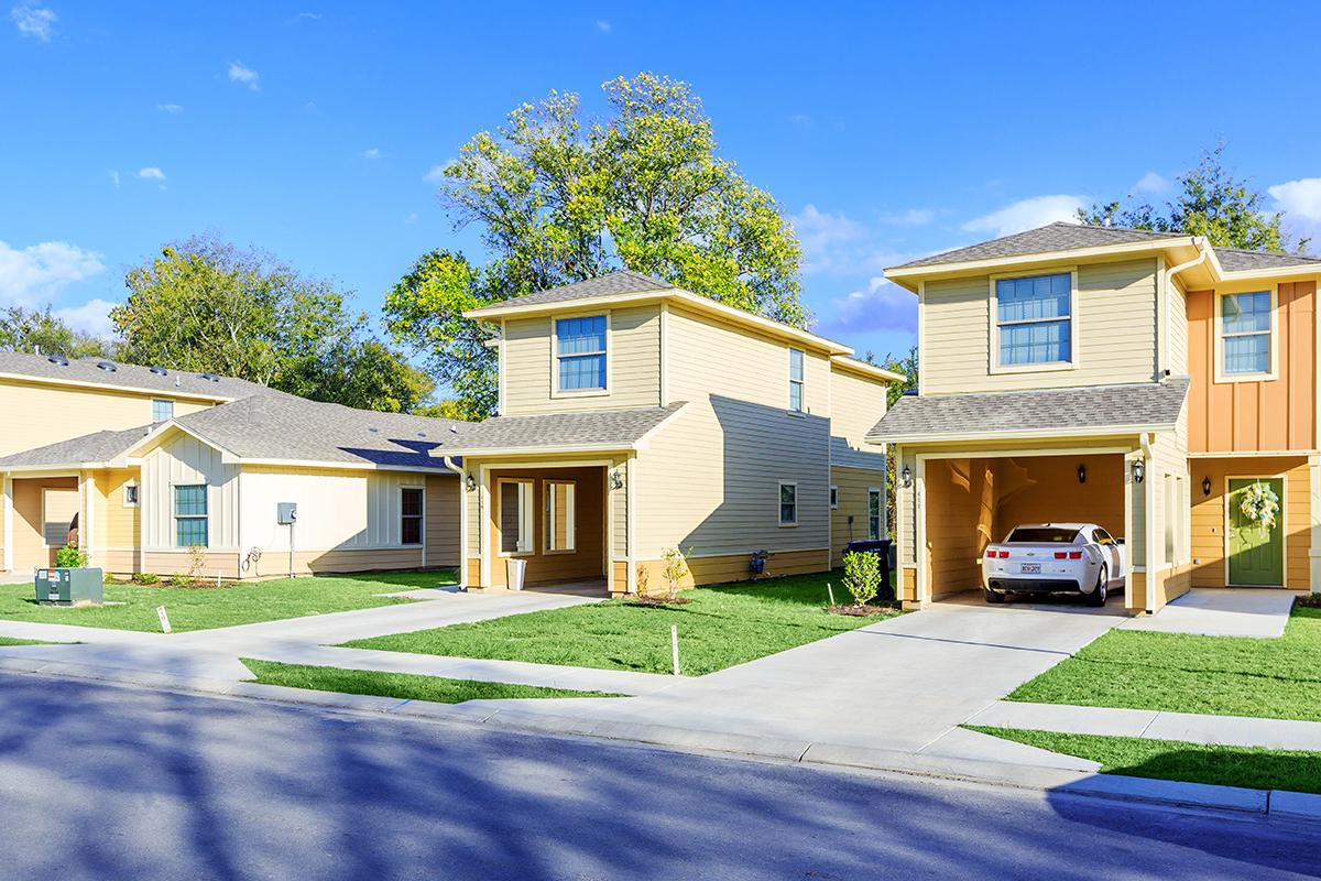 a large lawn in front of a house