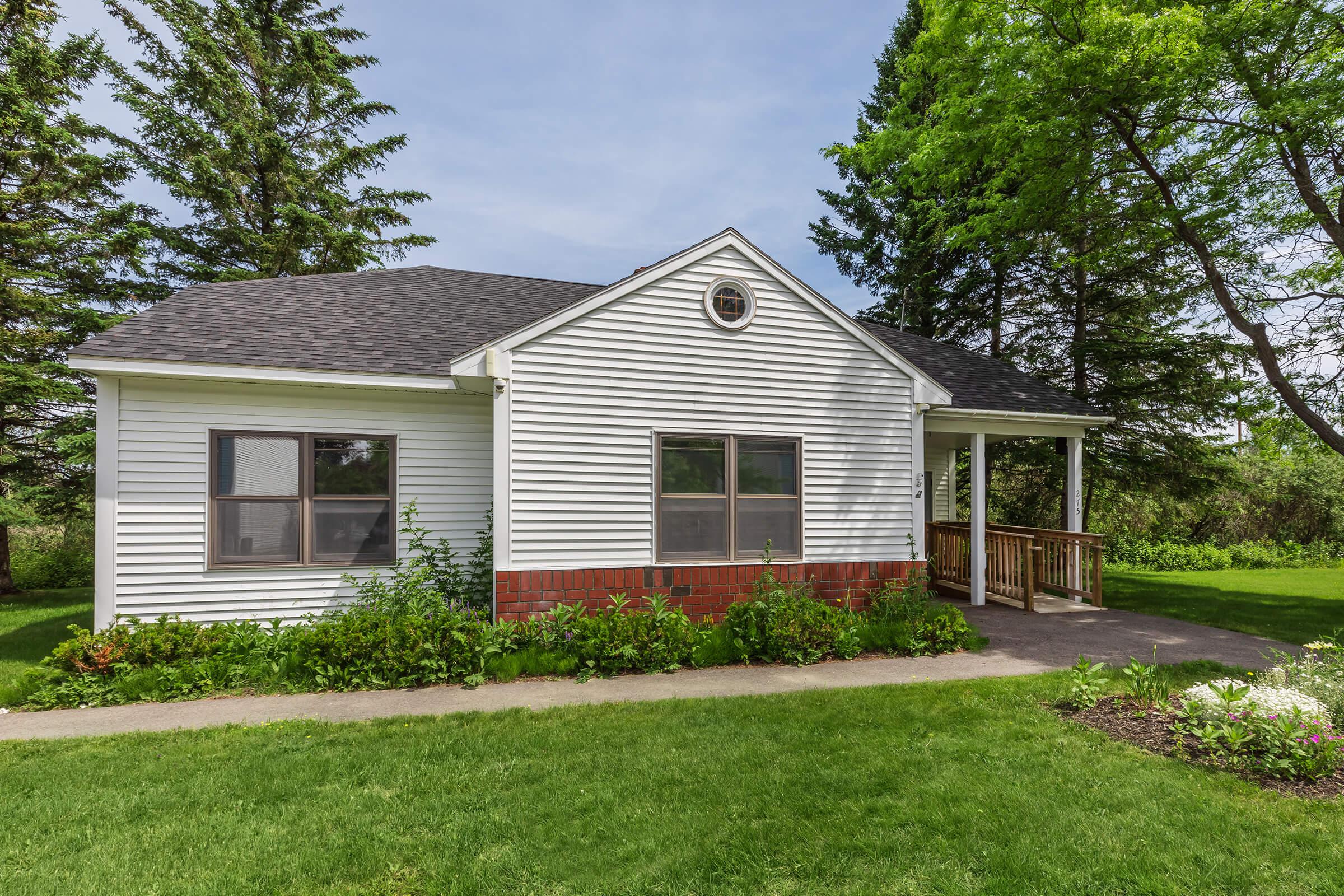 a large lawn in front of a house