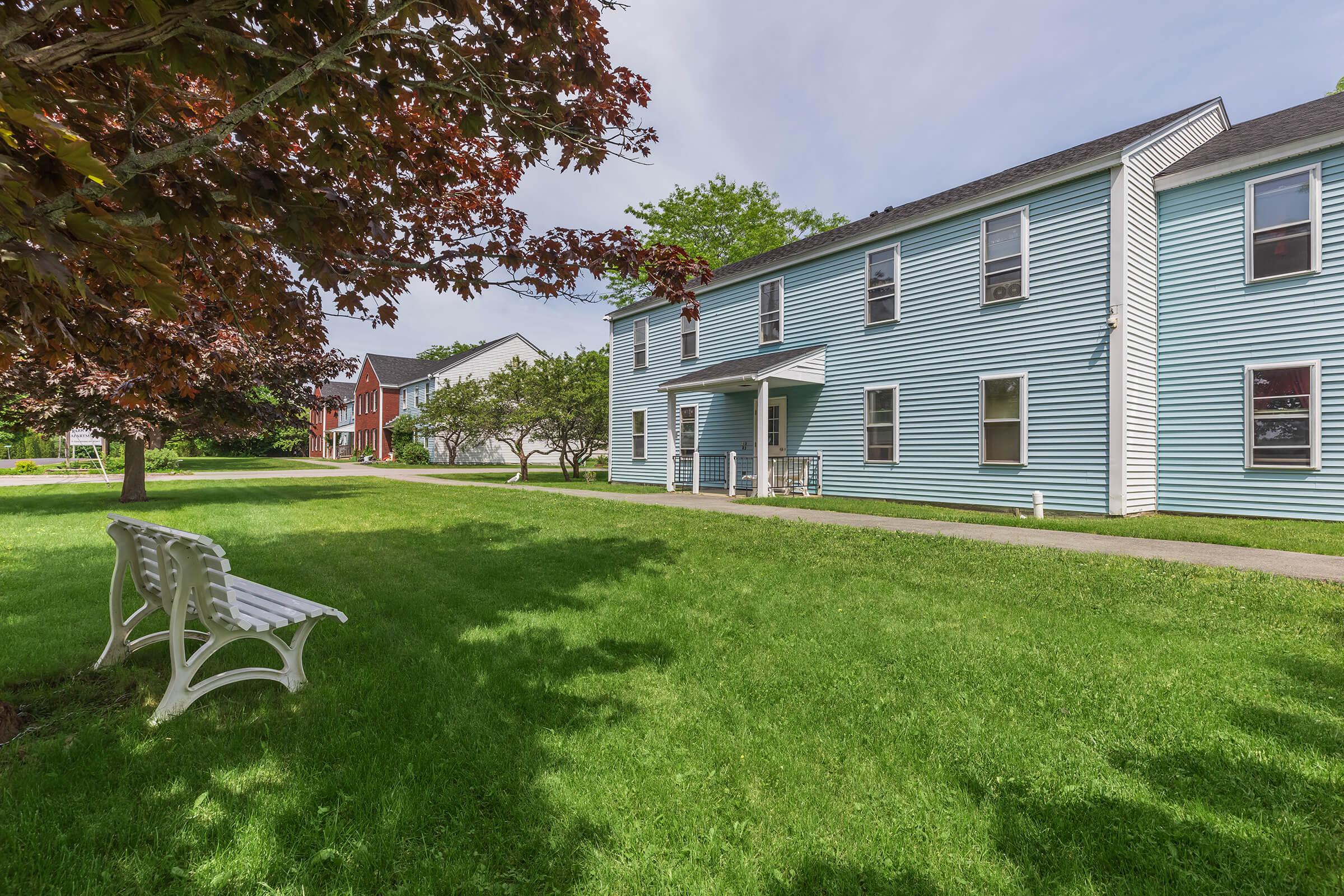 a large lawn in front of a house