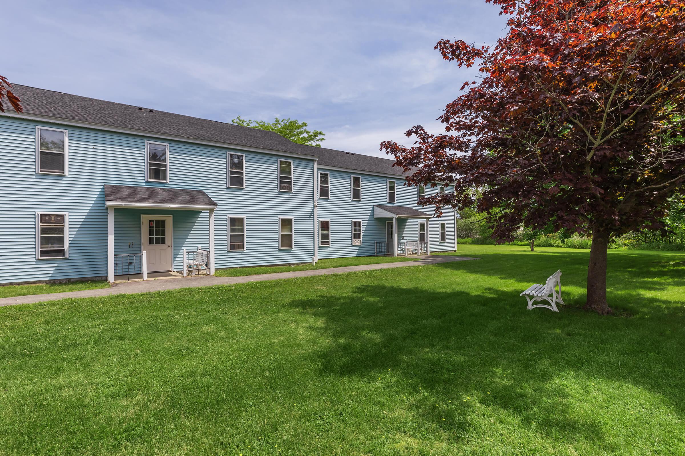 a large lawn in front of a house