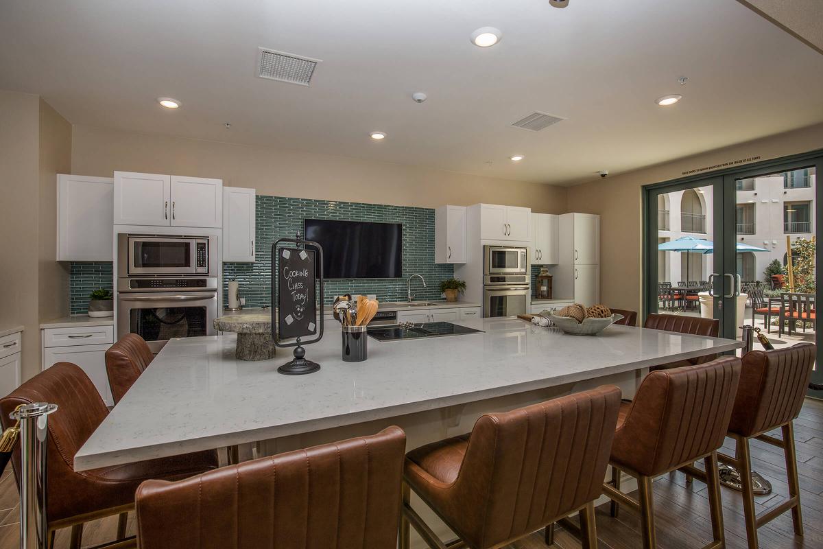 Luxaira community kitchen with stainless steel appliances