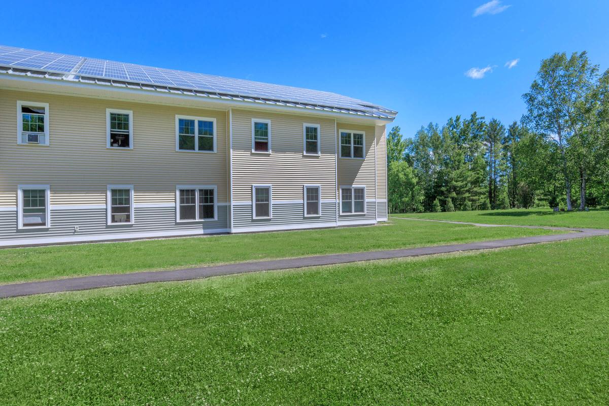 a large lawn in front of a house