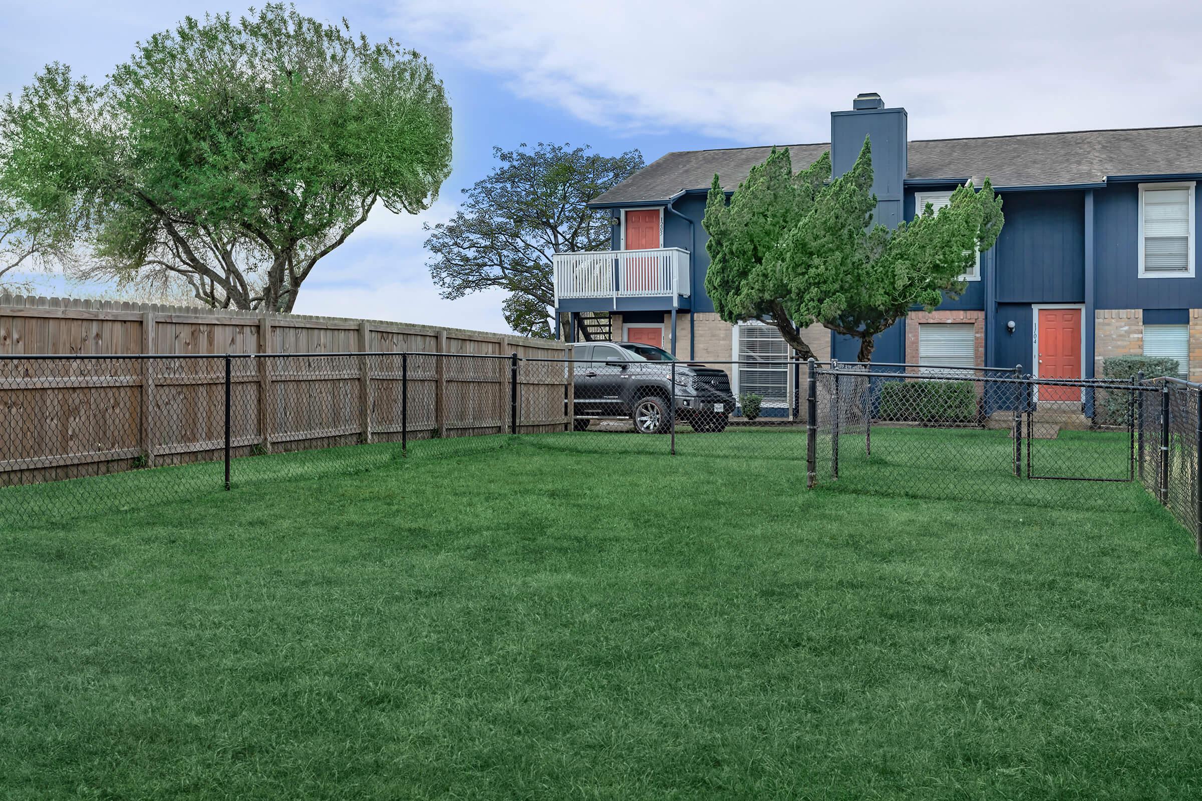 a large lawn in front of a house