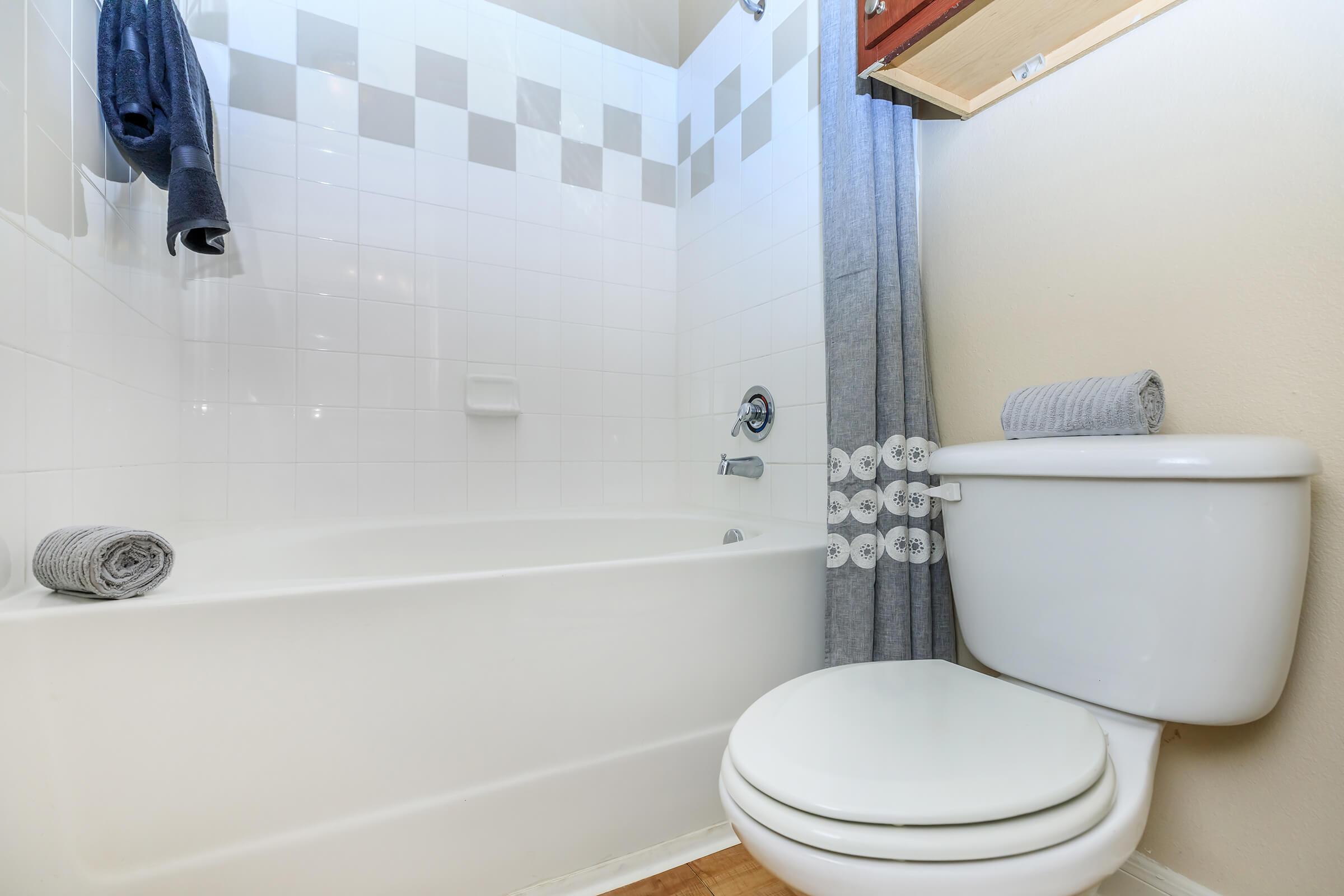 a room with a sink and a mirror