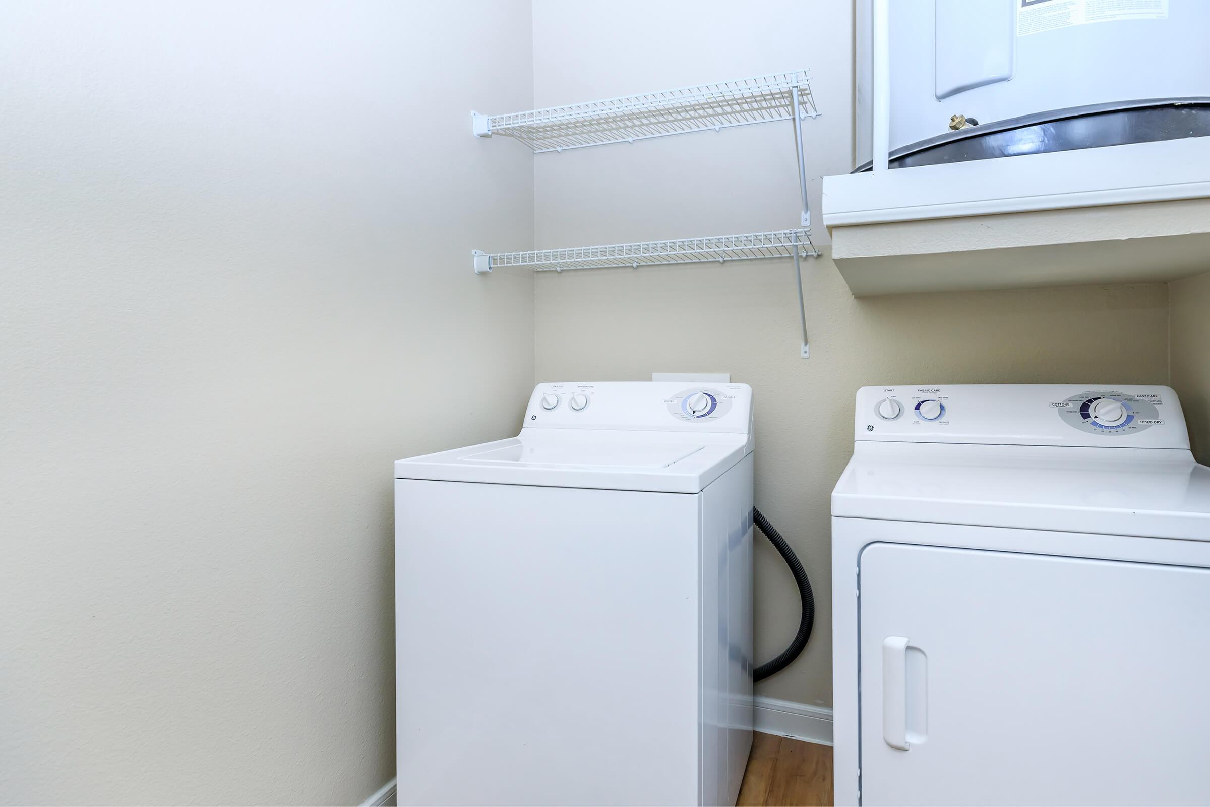 a close up of a sink and a refrigerator