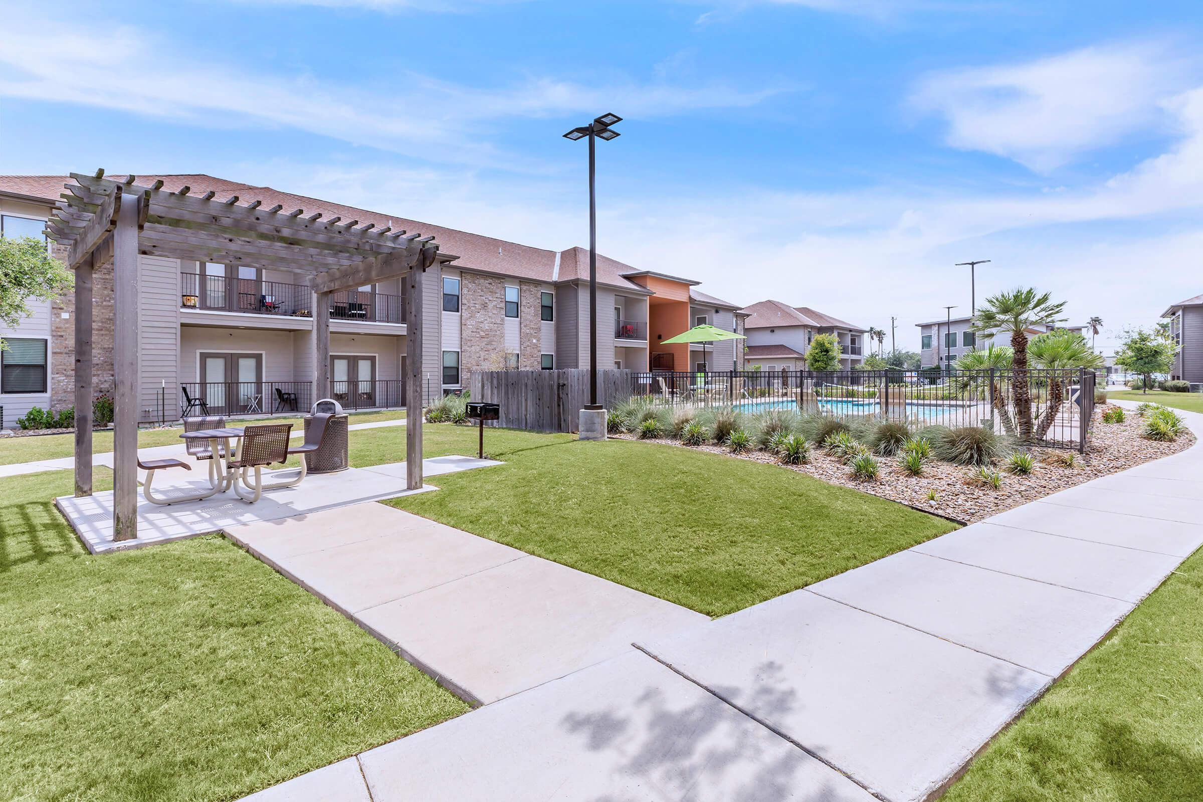 a large lawn in front of a building