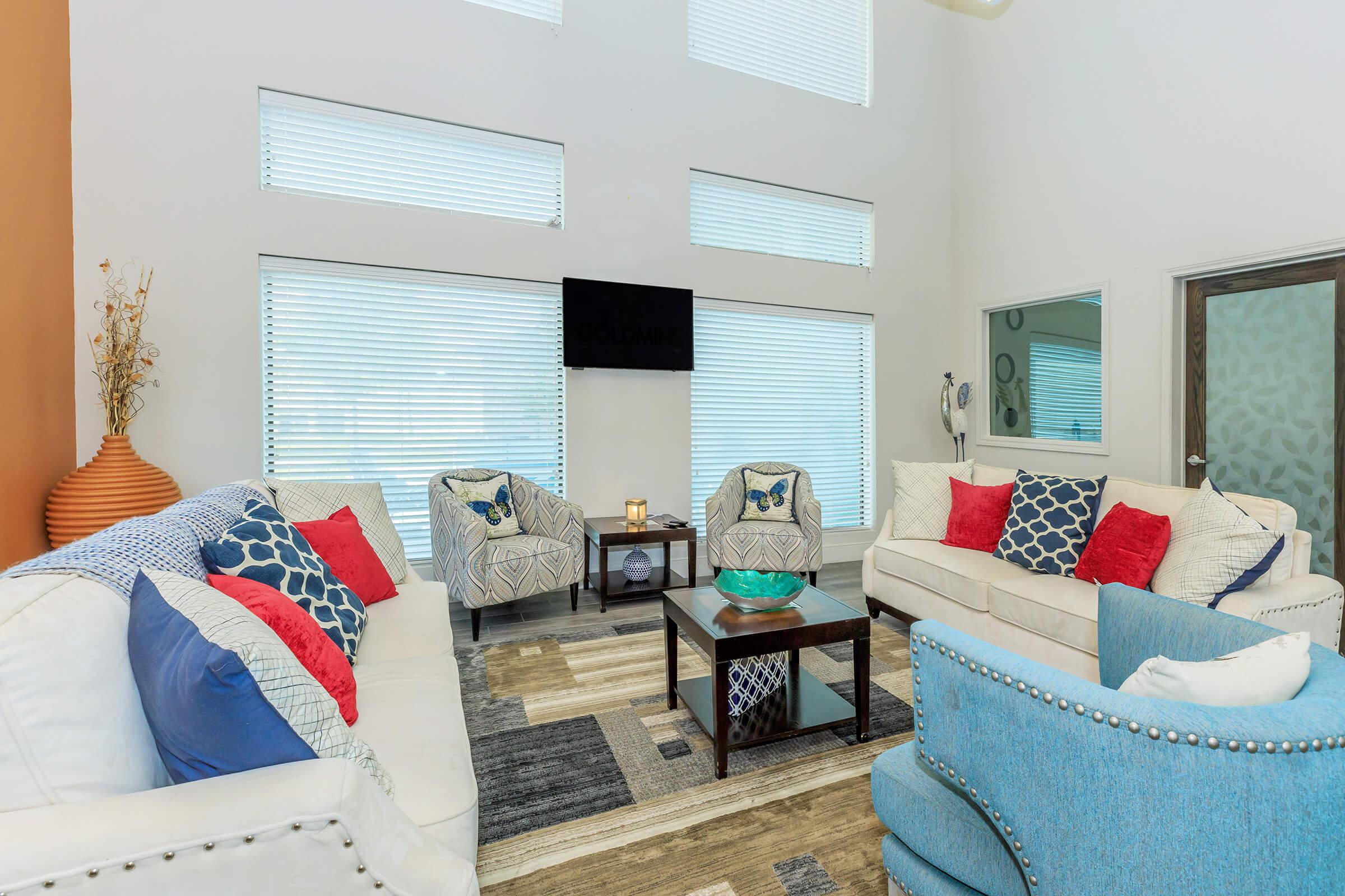 a living room with a blue blanket