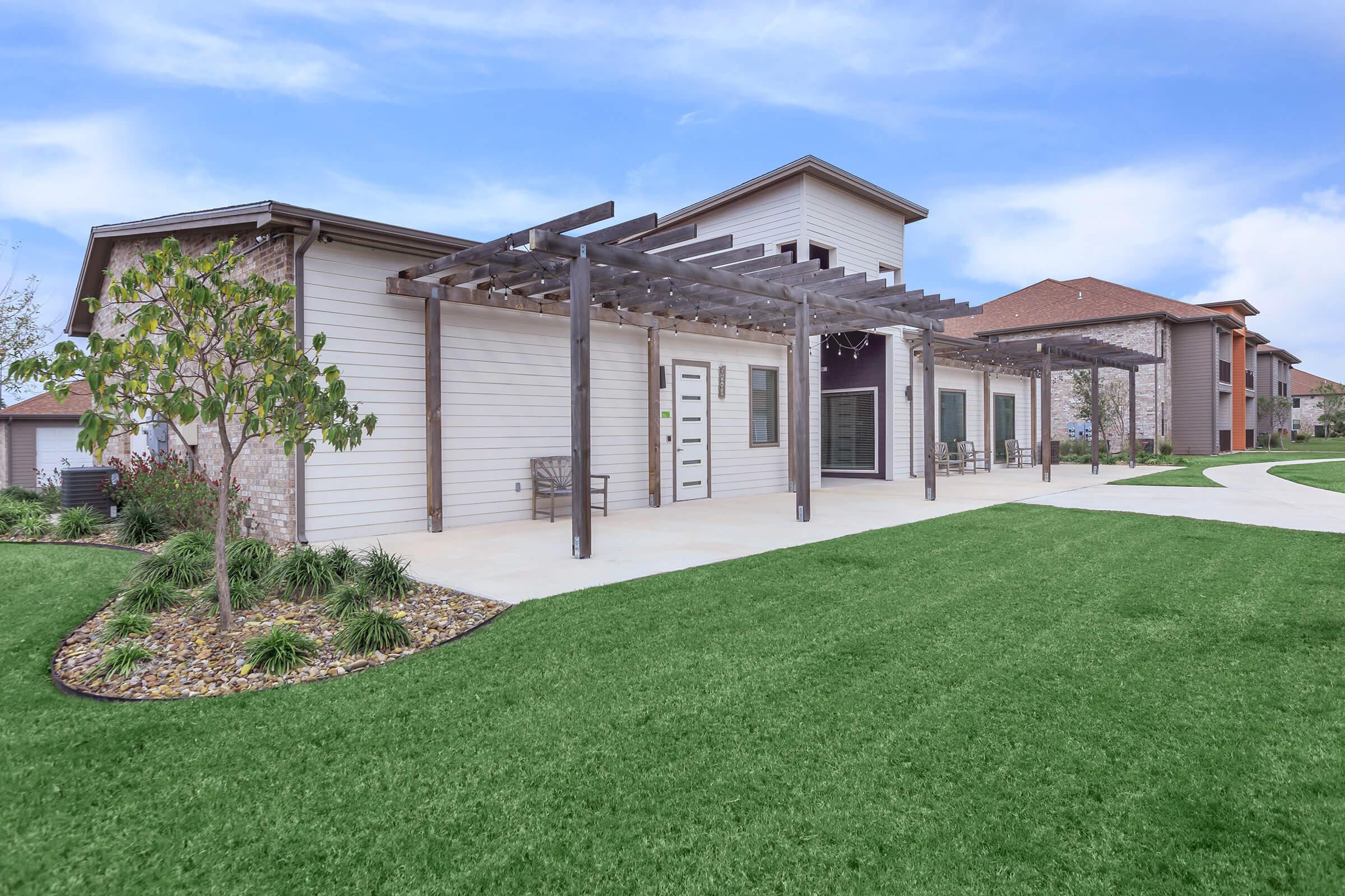 a large lawn in front of a house