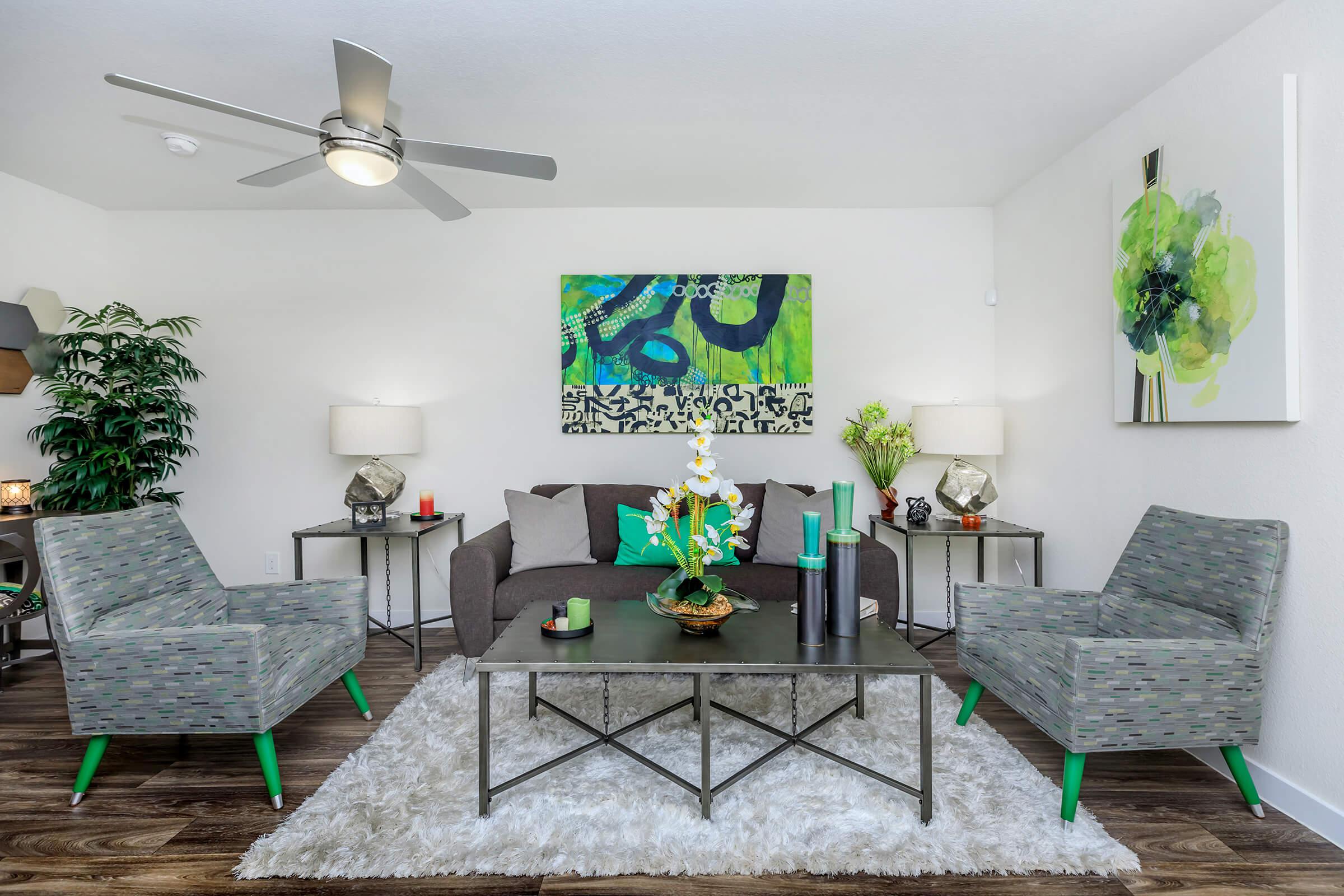 SPACIOUS LIVING ROOM HERE AT PINE FOREST APARTMENTS