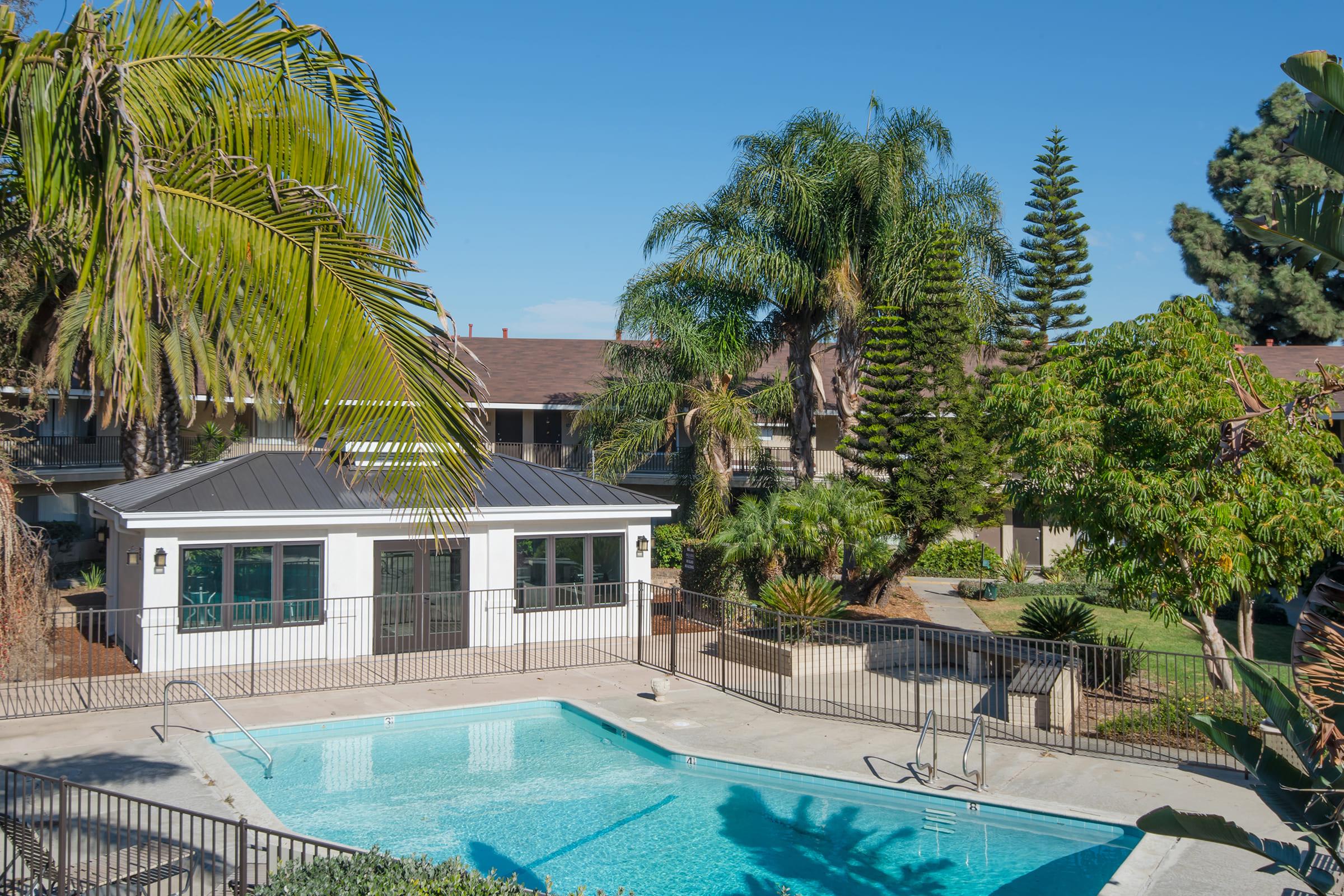 a view of a pool in front of a building