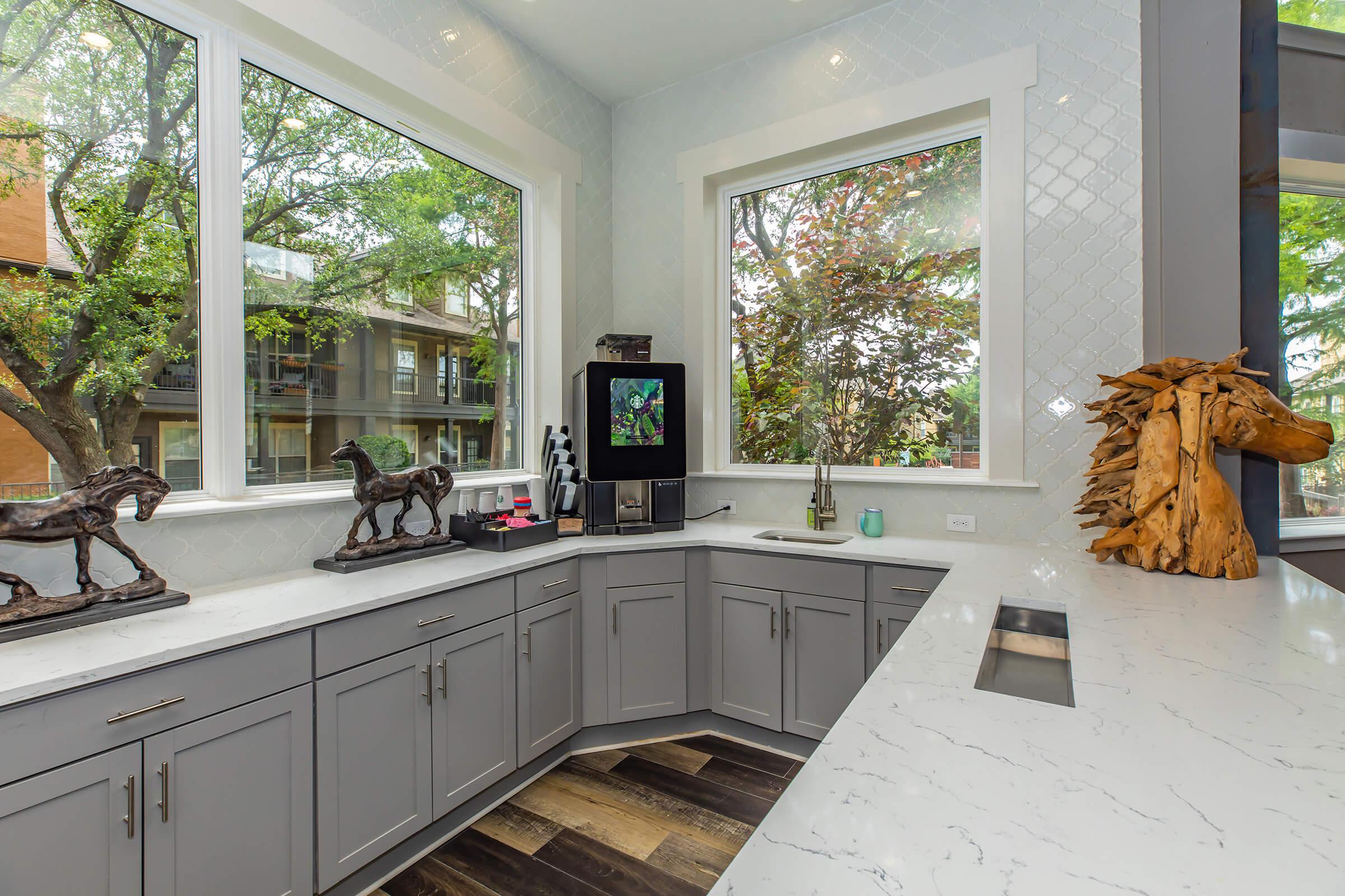 community kitchen with wooden cabinets