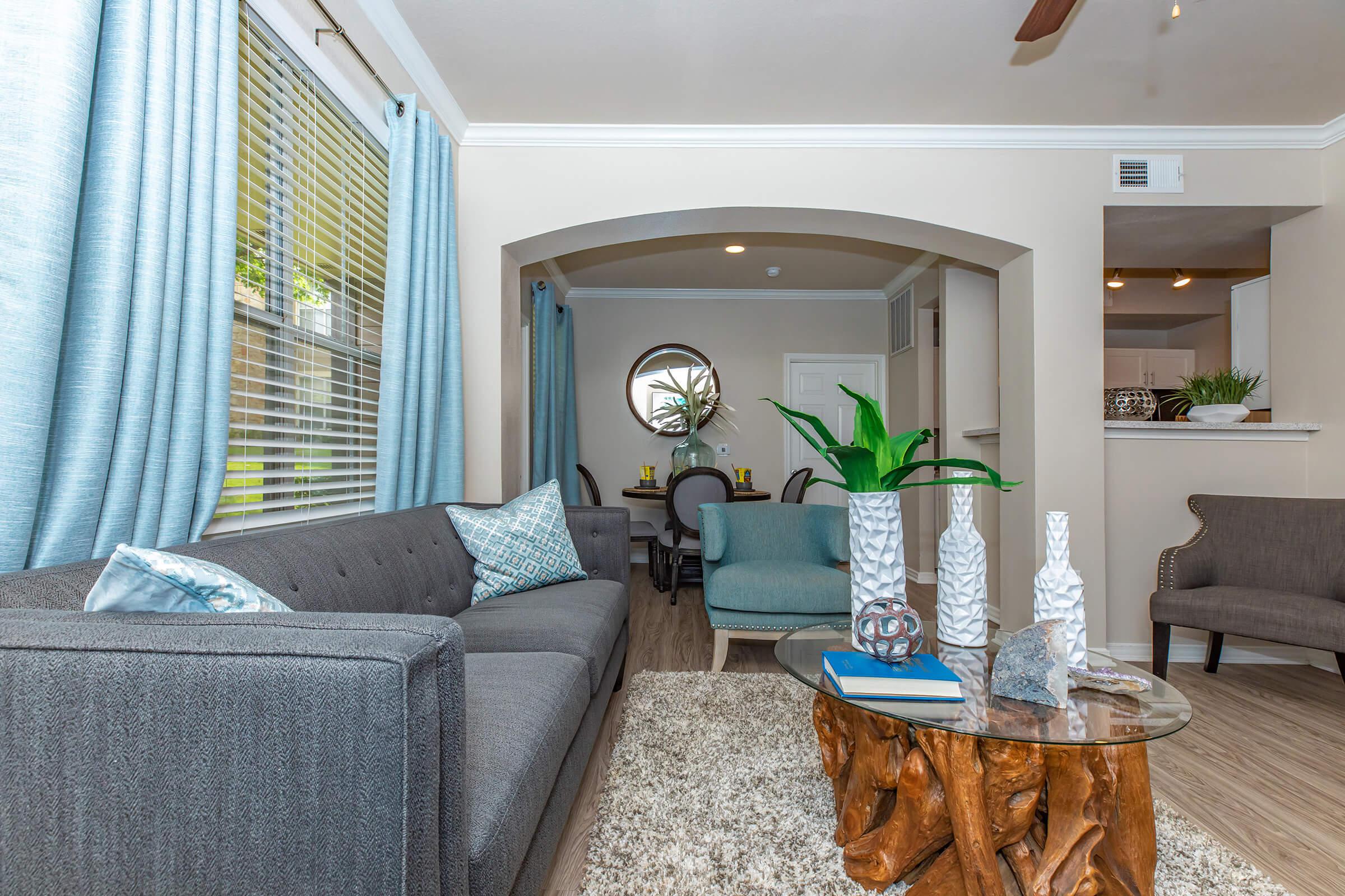 a living room with an area rug