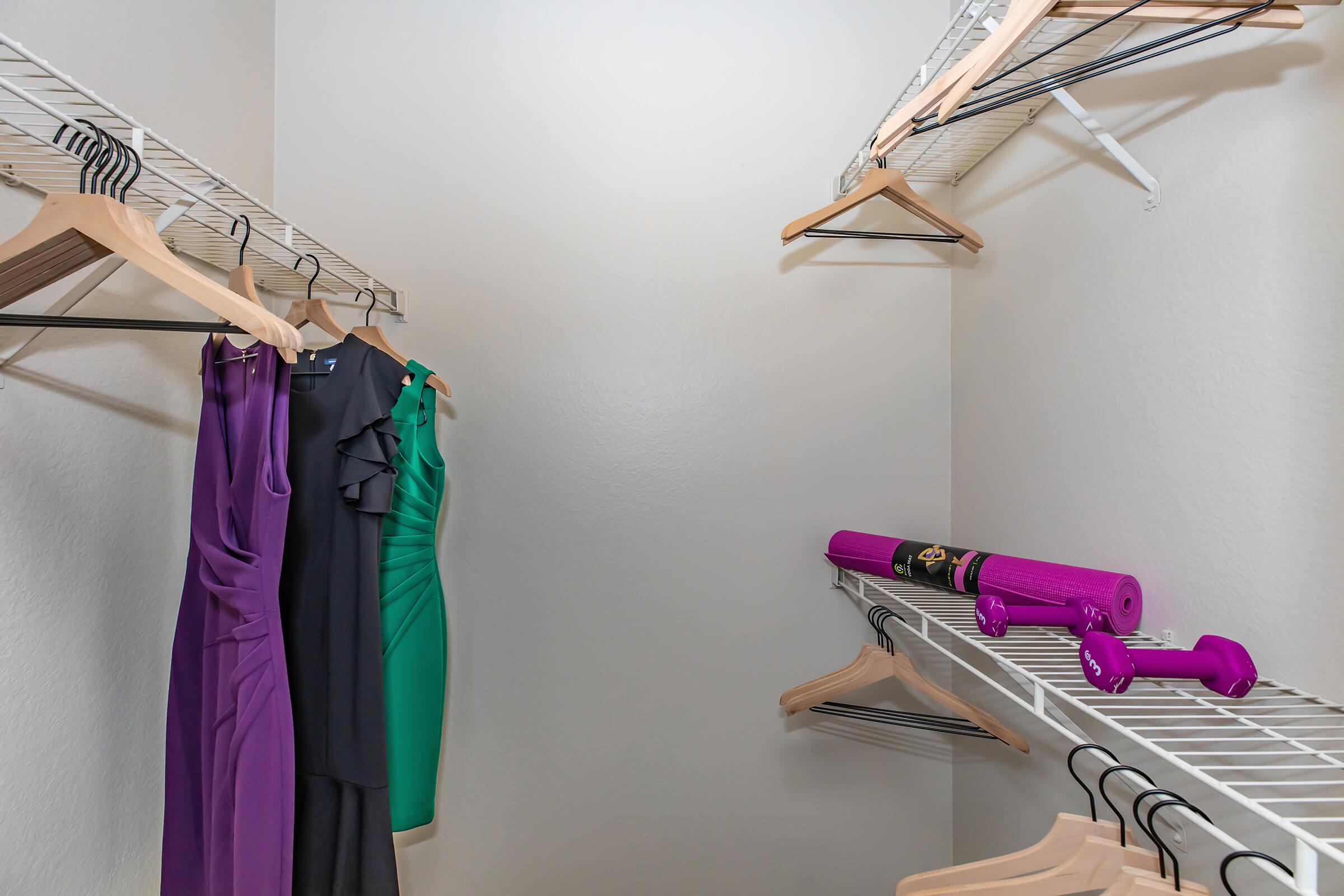 a furnished walk-in closet