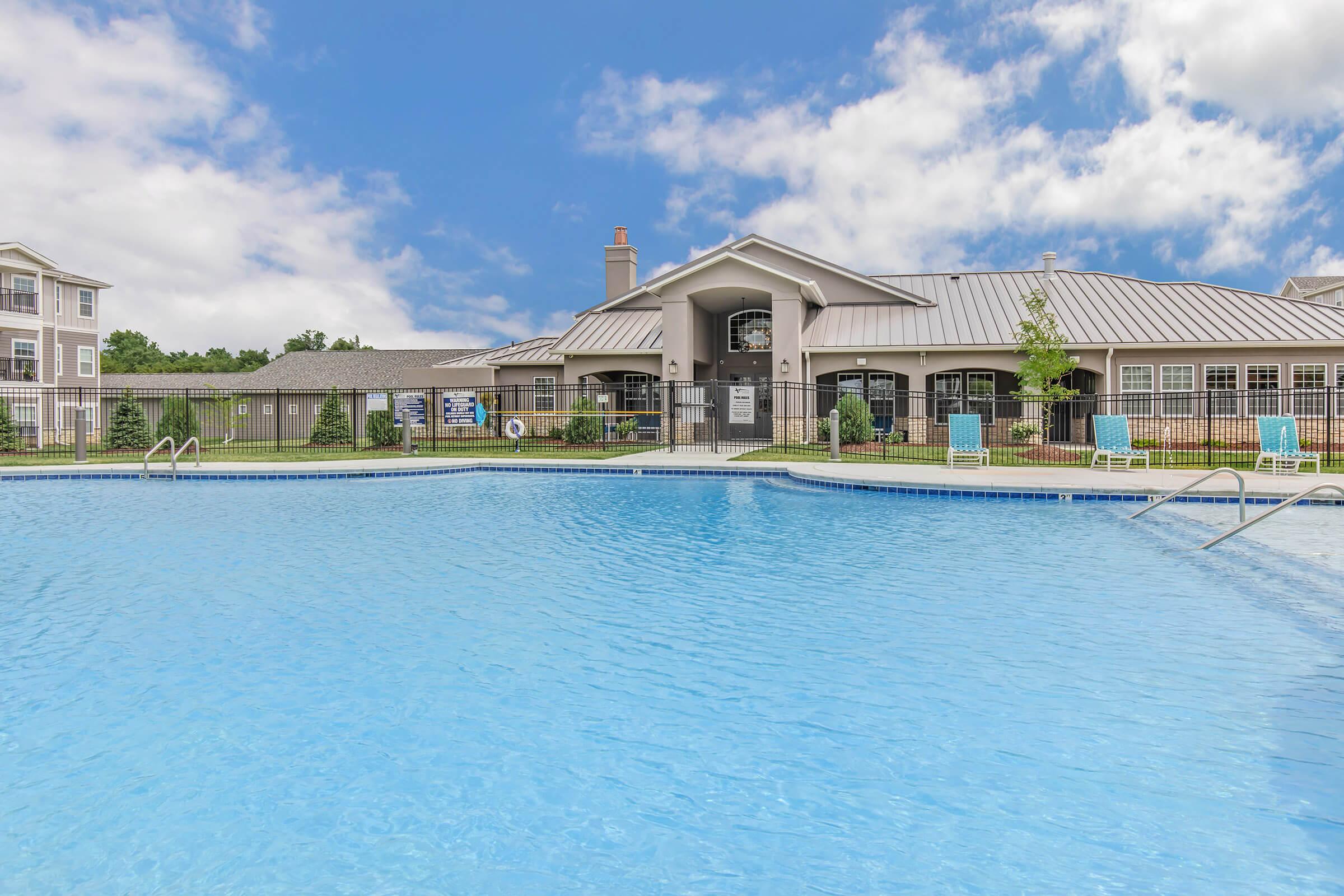 a house with a large pool of water