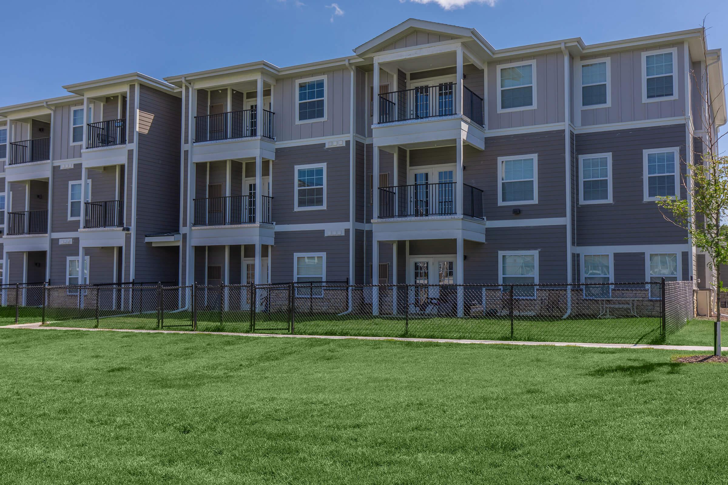 a large lawn in front of a house