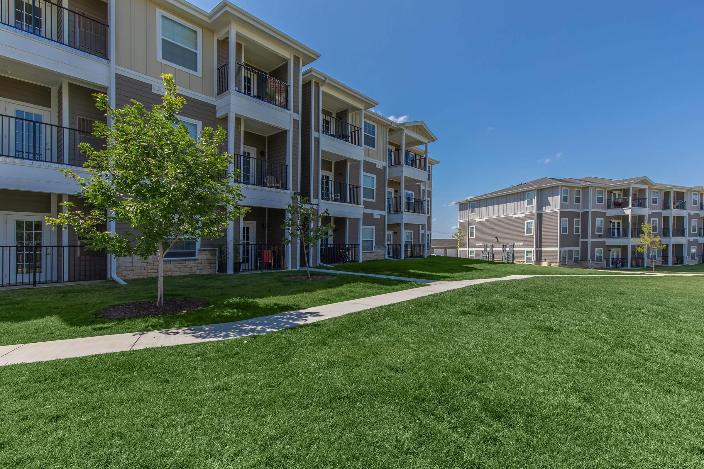 a large lawn in front of a house