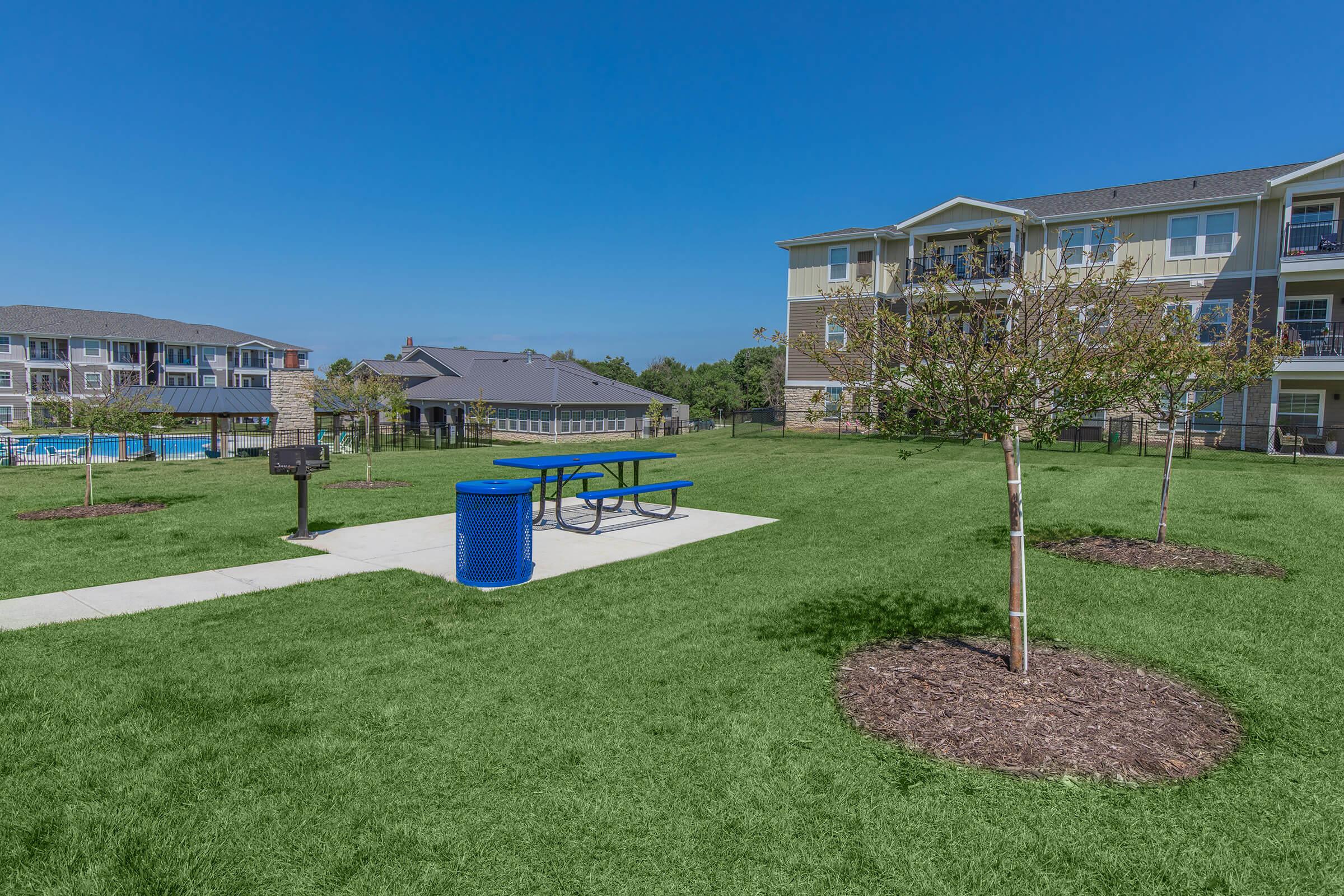 a large lawn in front of a building