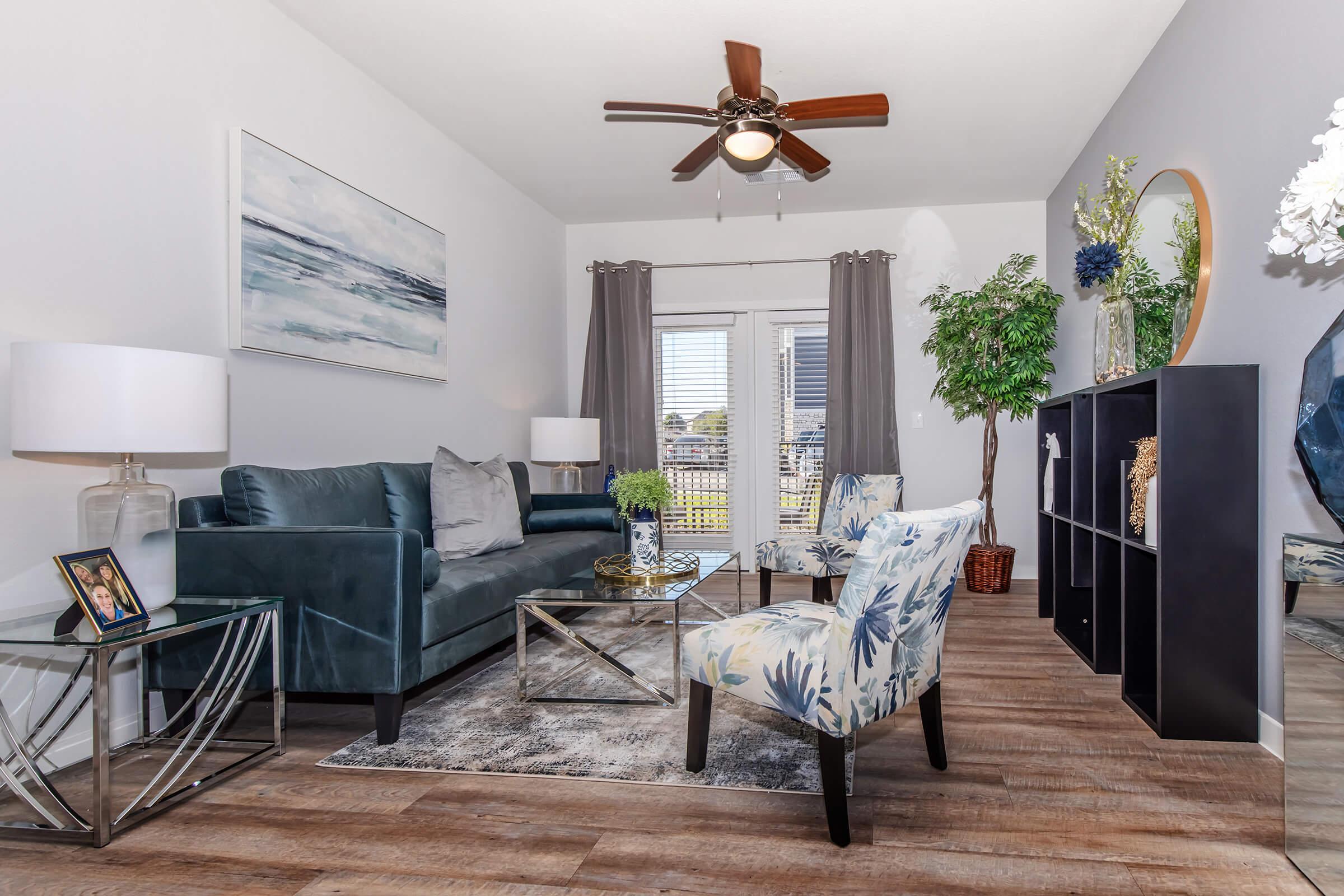 a living room filled with furniture and a fireplace