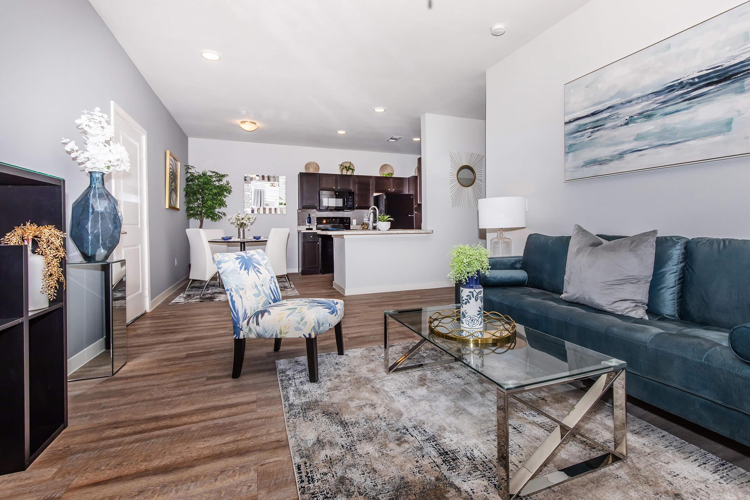 a living room filled with furniture and a fireplace