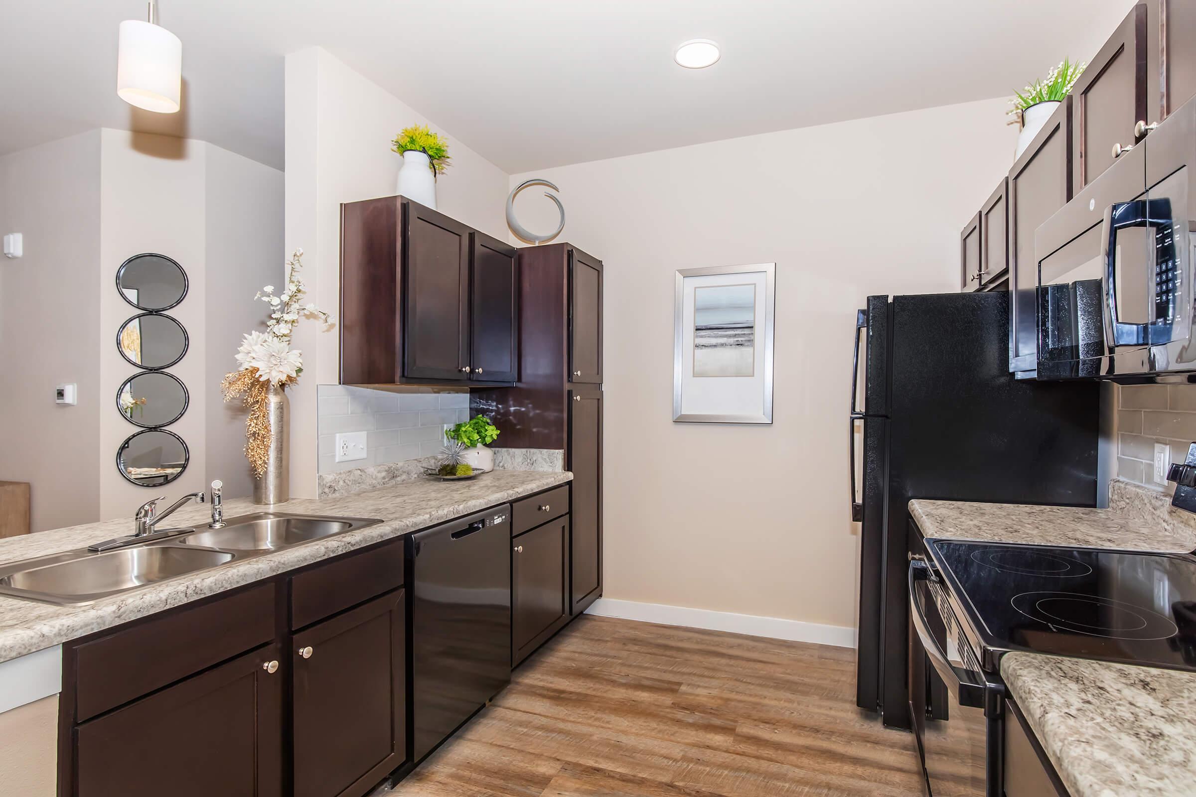 a modern kitchen with stainless steel appliances