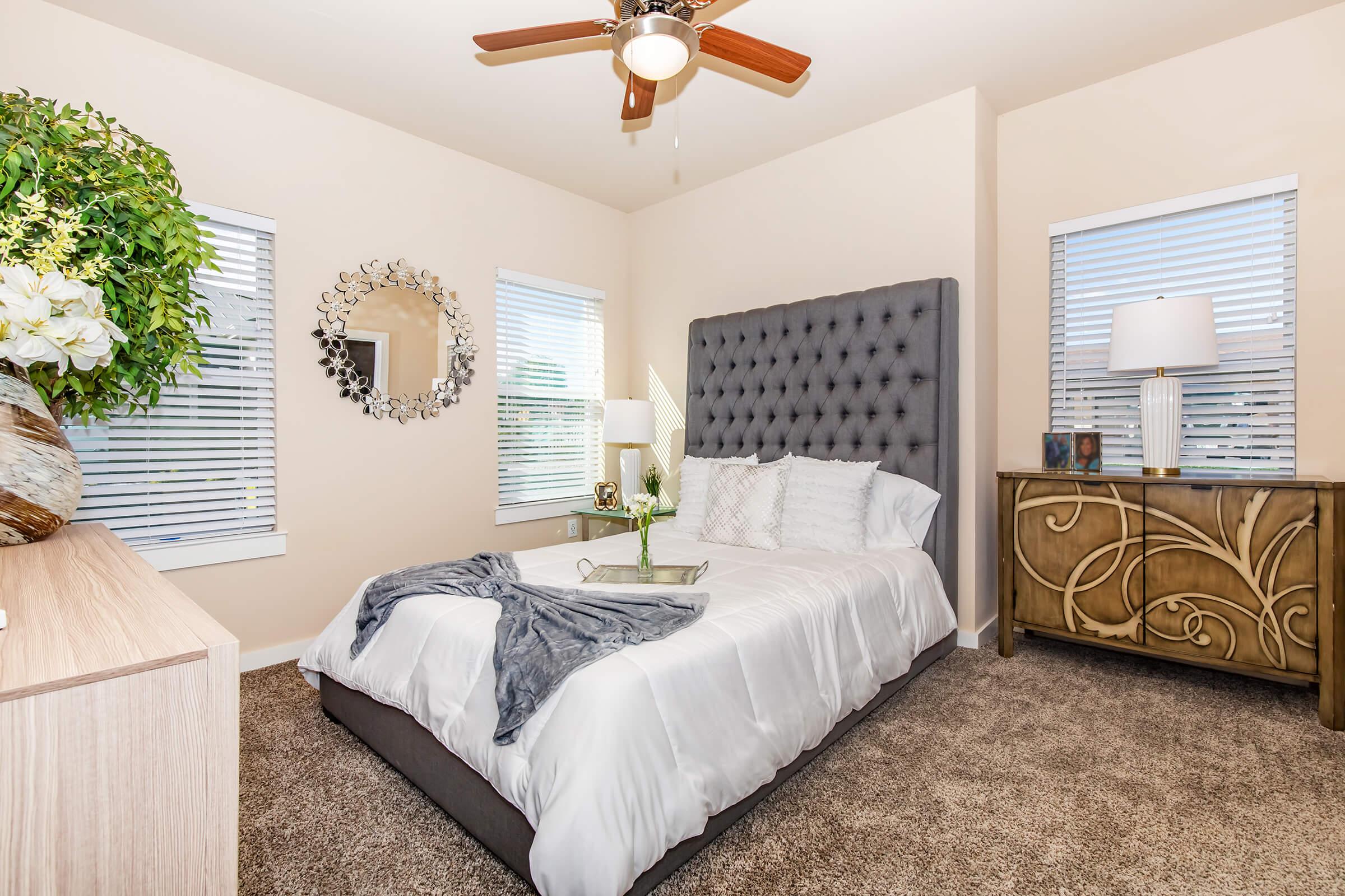 a bedroom with a bed in a hotel room