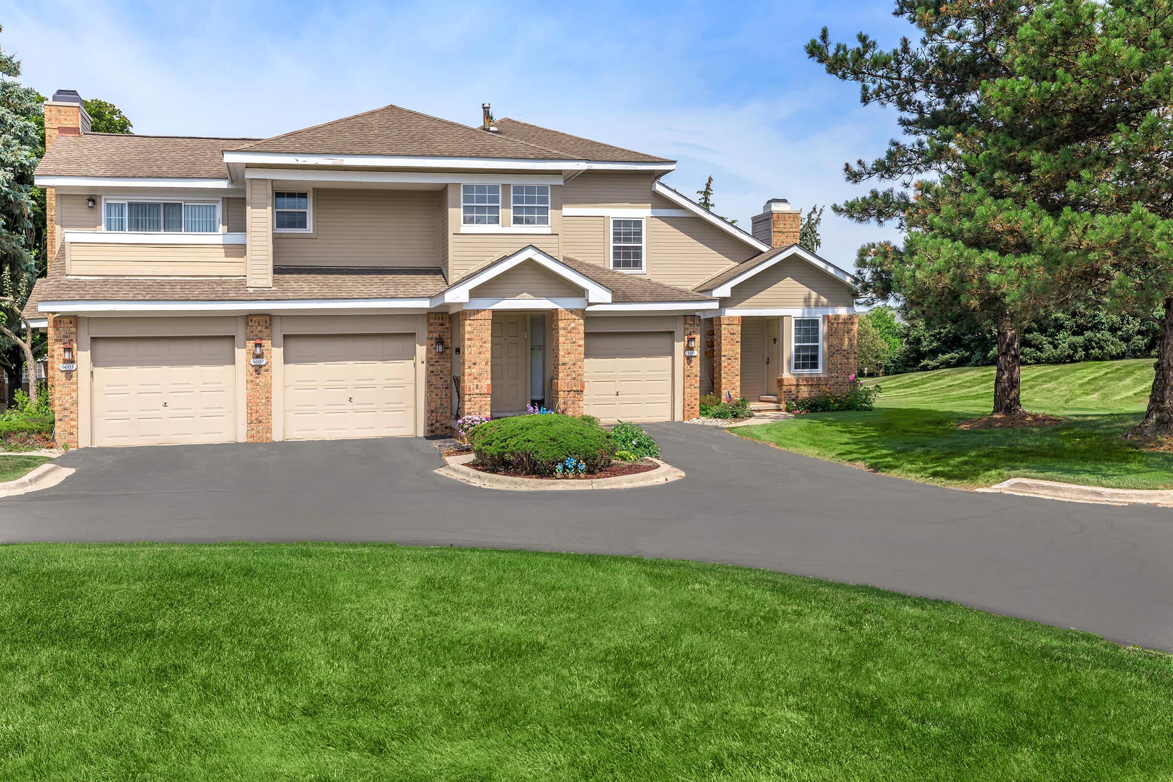 a large lawn in front of a house